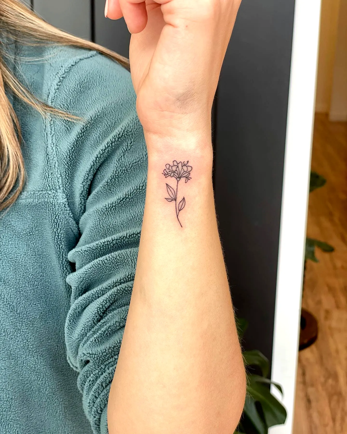 Delicate Flower Inner Forearm Tattoo