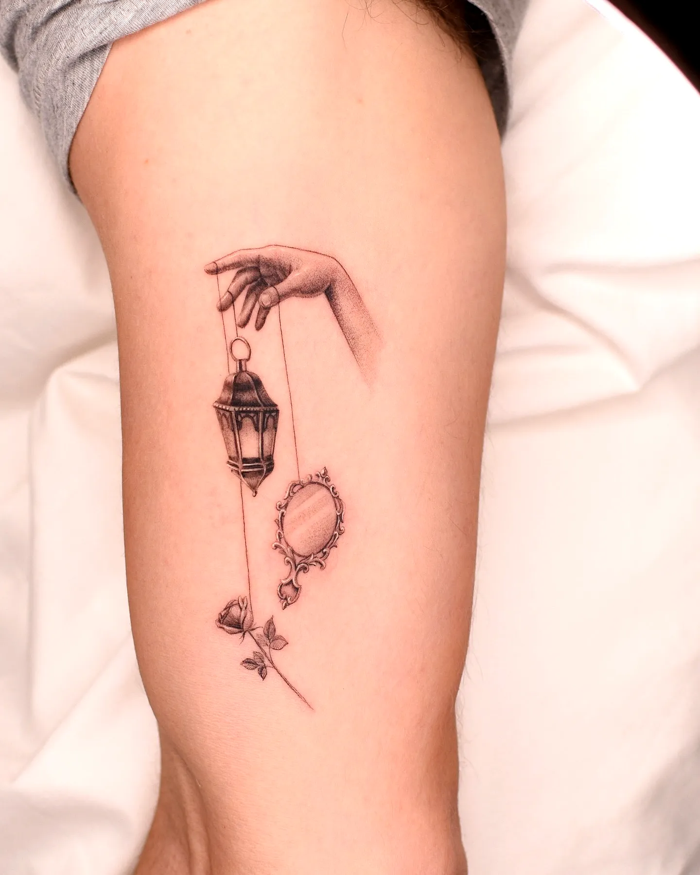 Delicate Hand Lantern Thigh Tattoo