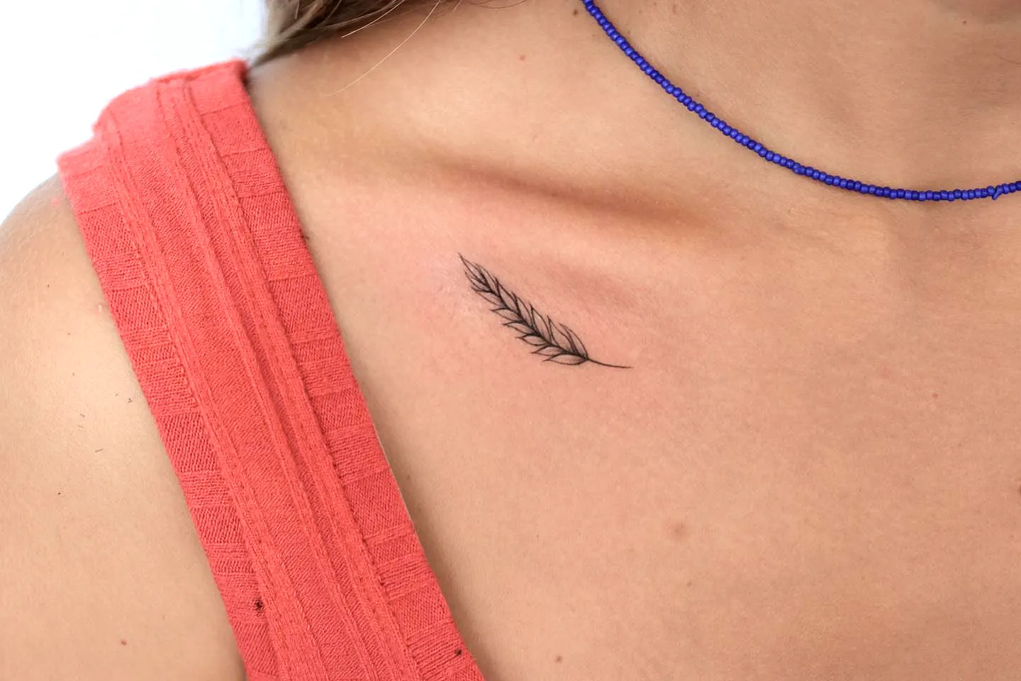Delicate Leaf Collarbone Tattoo
