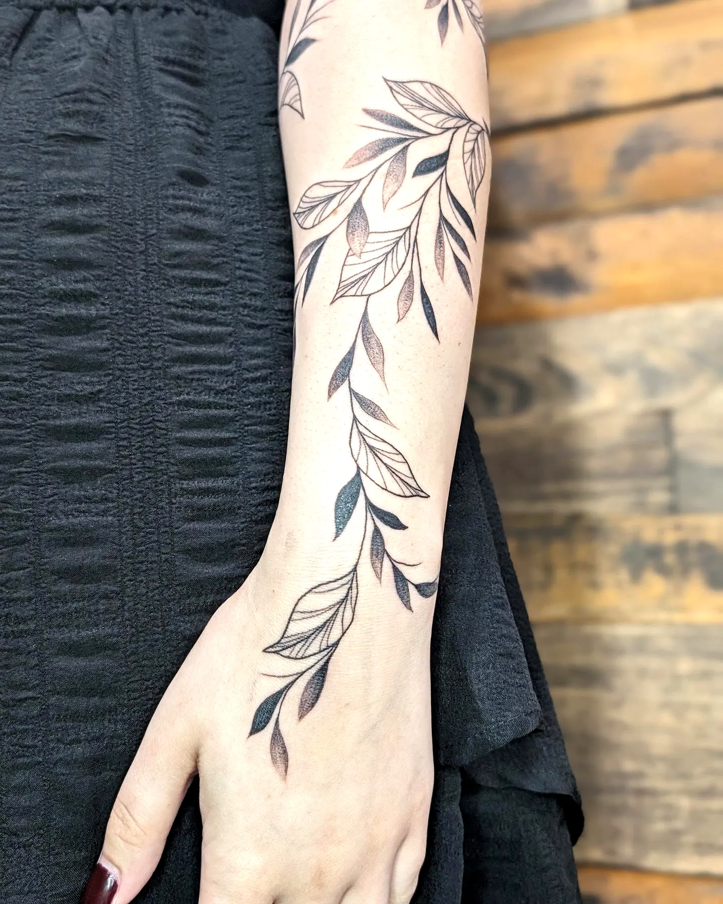 Delicate Leaf Forearm Tattoo Design