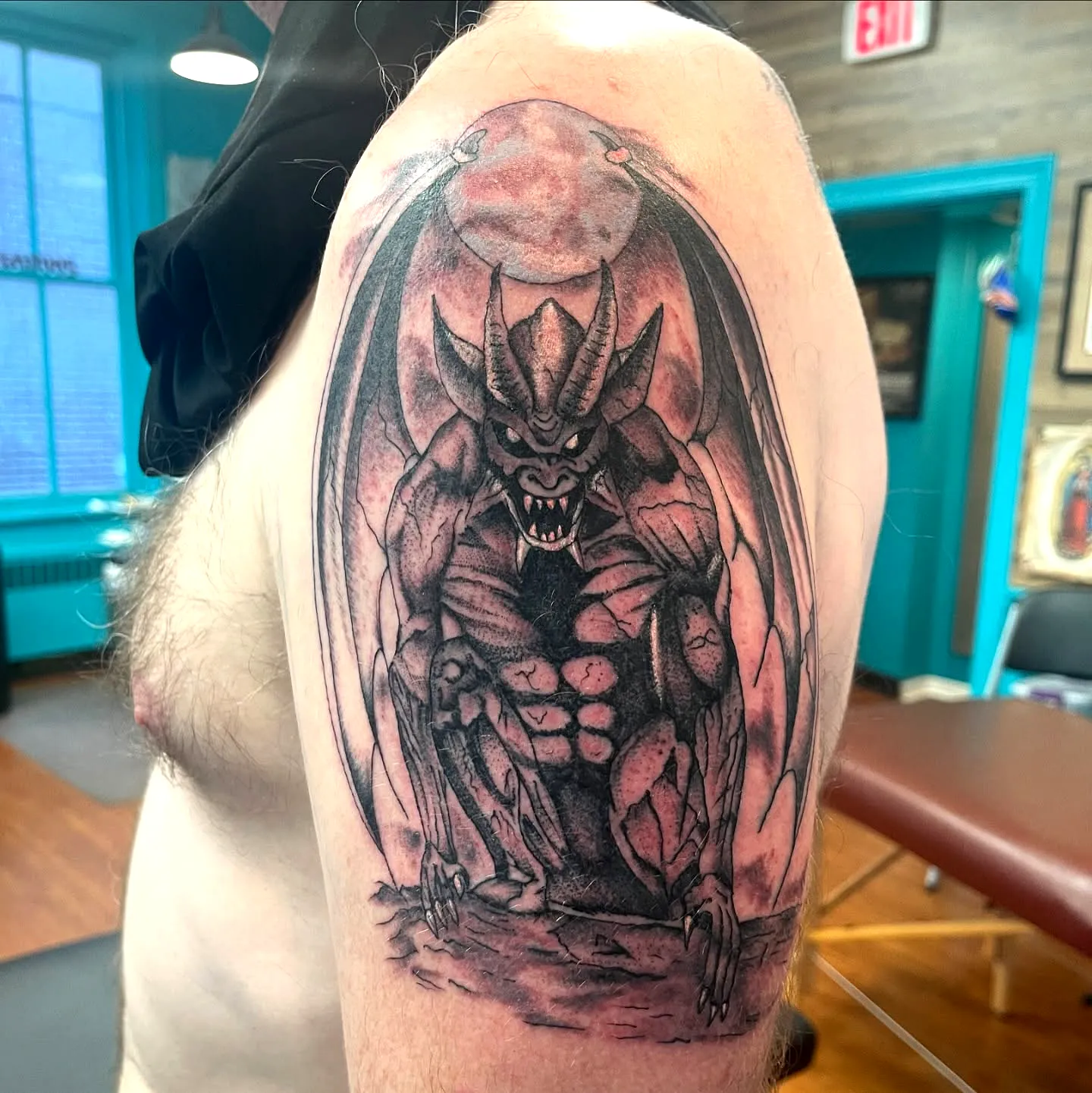 Demonic Winged Arm Tattoo in Dark Shades