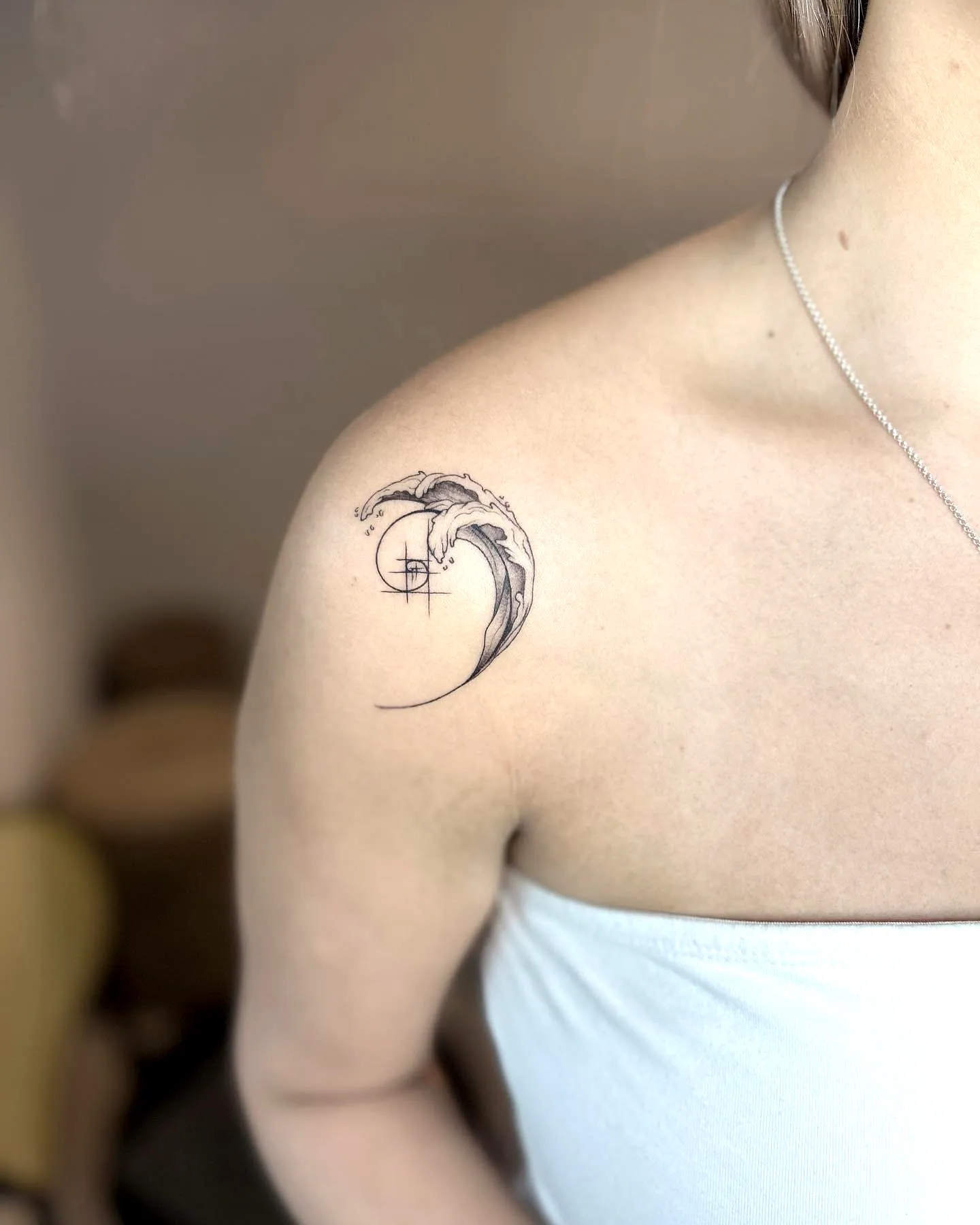 Dolphin Wave Upper Shoulder Tattoo
