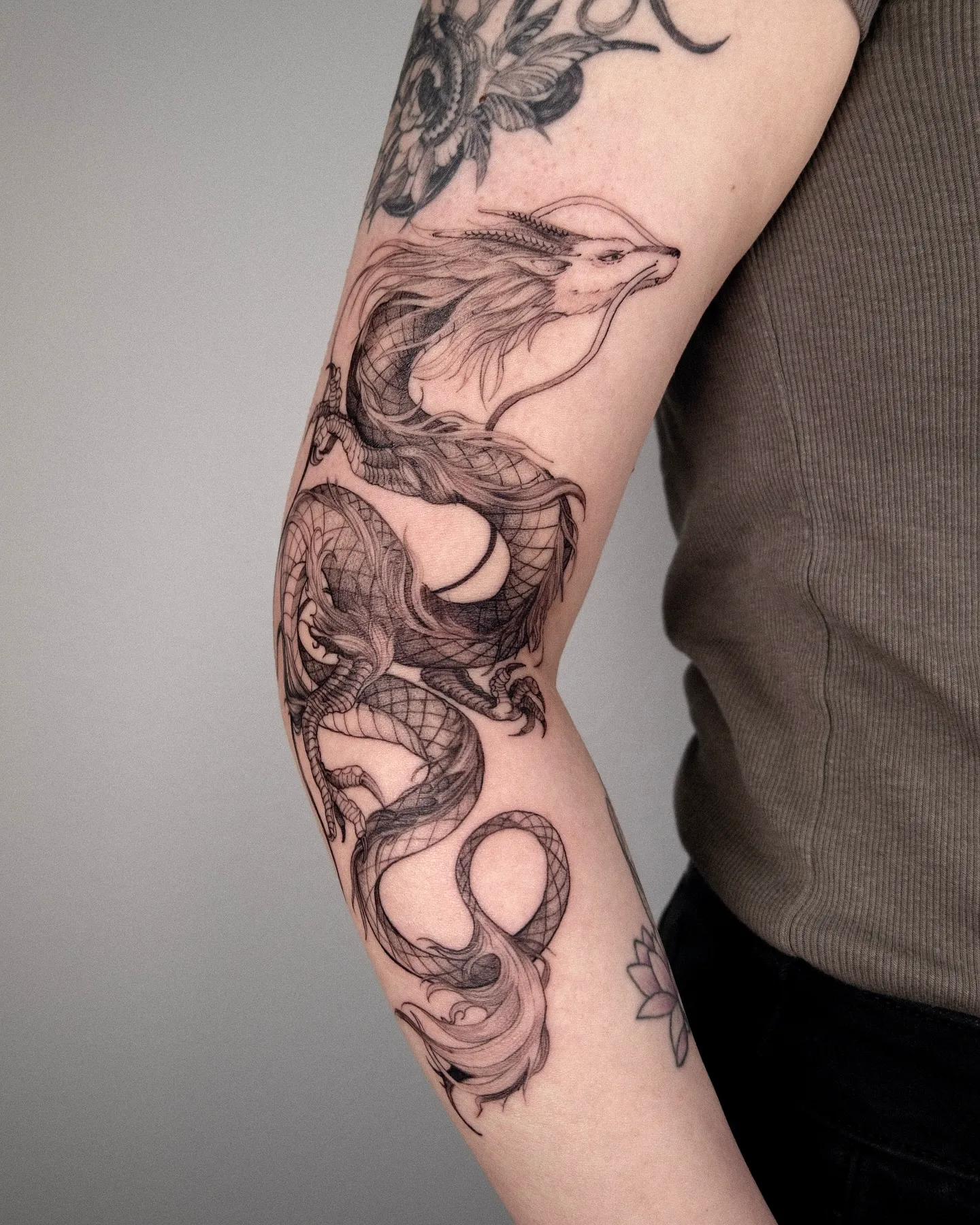Dragon and Fox Forearm Tattoo
