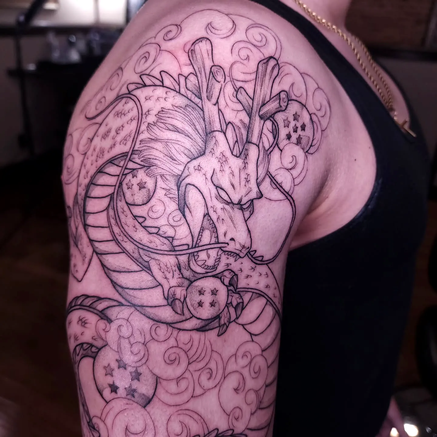 Dragon Arm Tattoo with Seven Stars