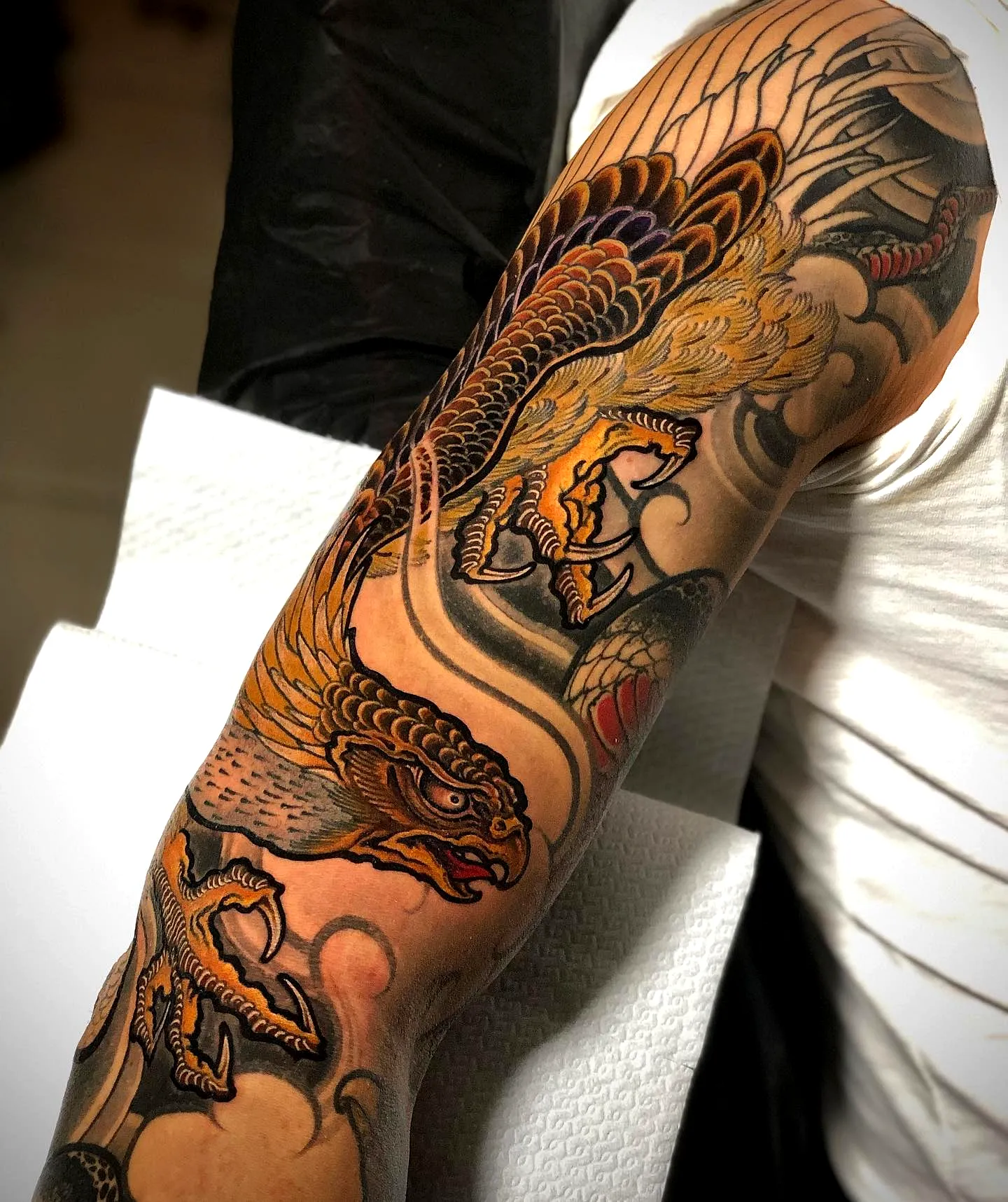 Dragon Phoenix Forearm Tattoo