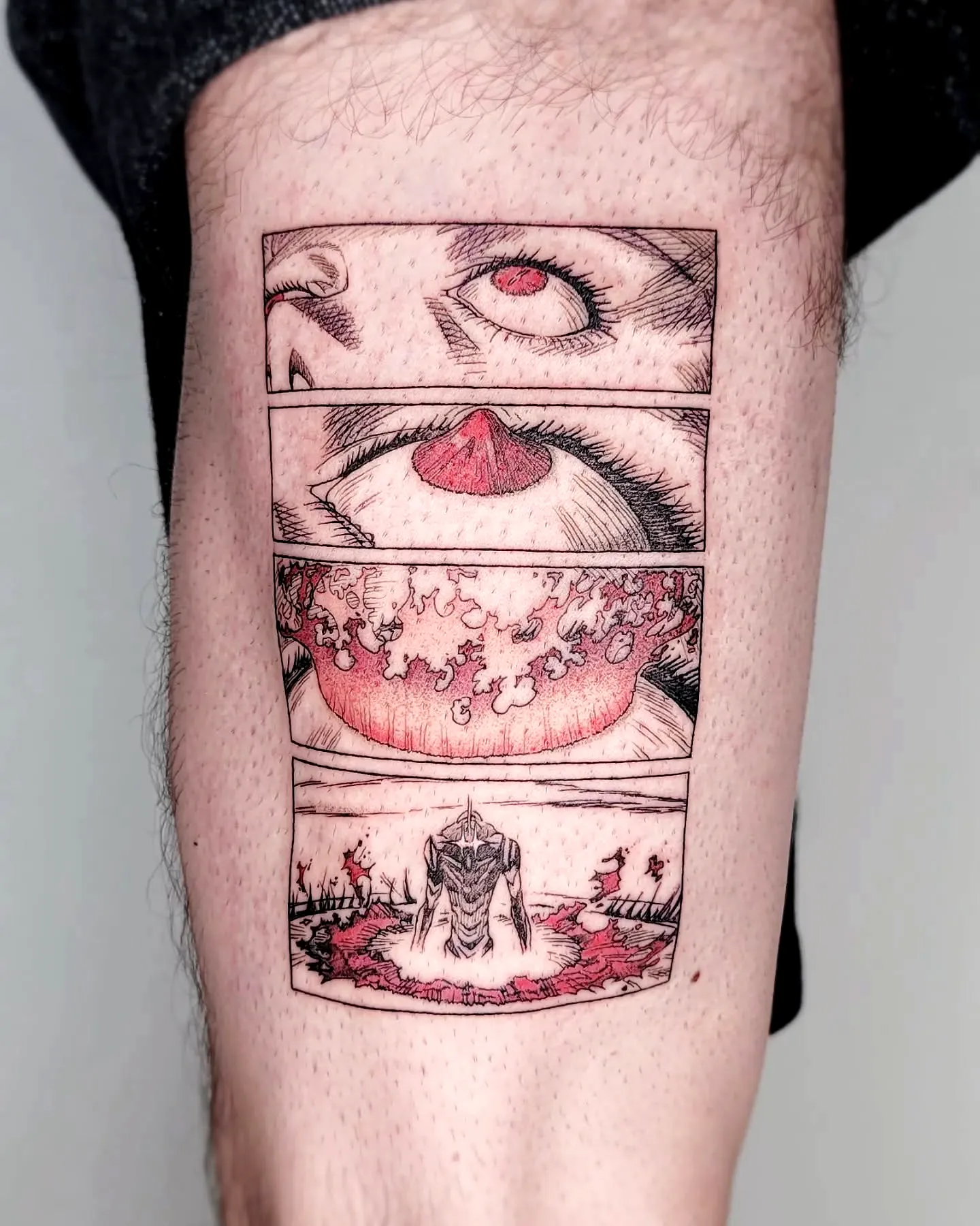 Dramatic Forearm Tattoo in Black and Red