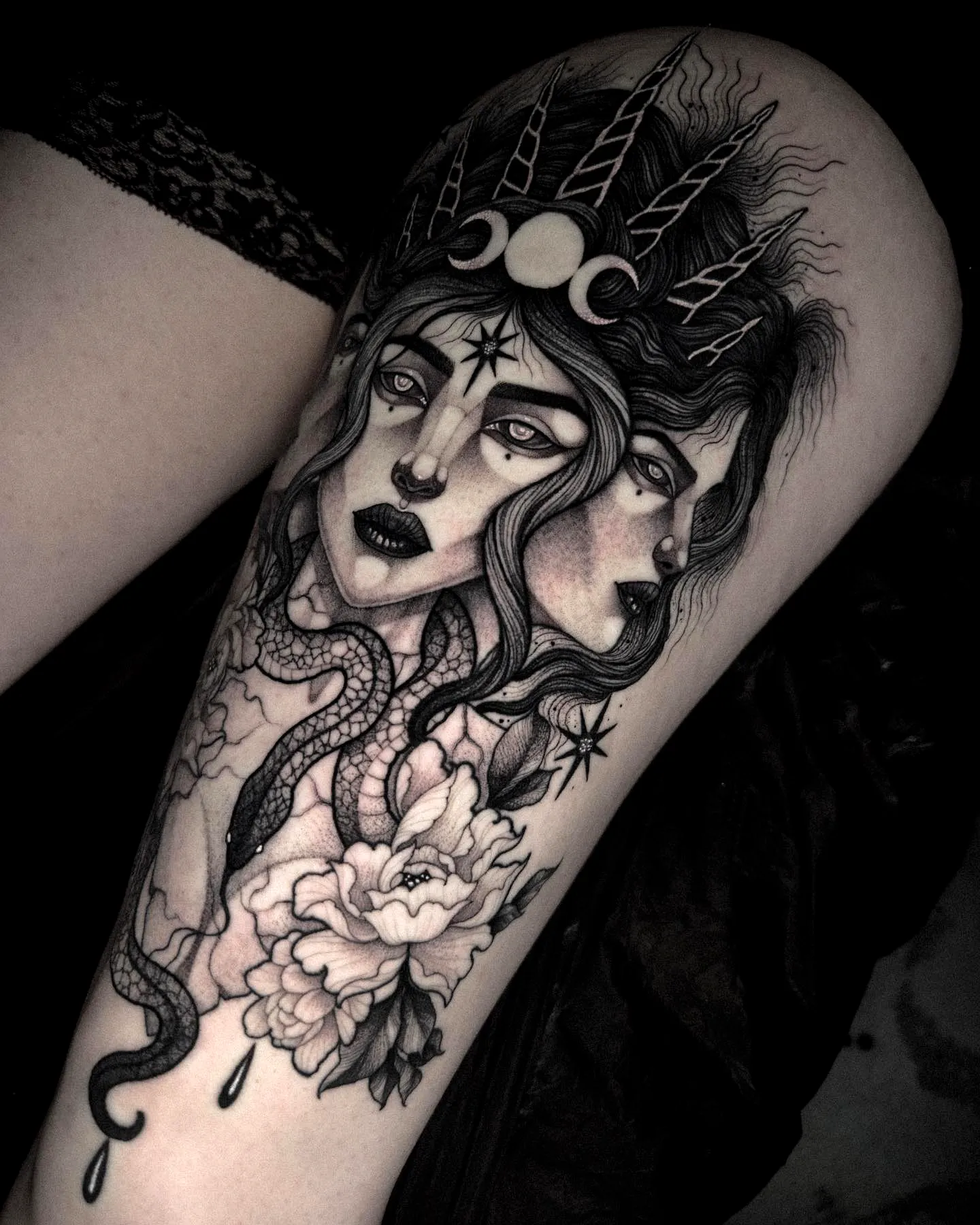 Dual-faced Woman Thigh Tattoo