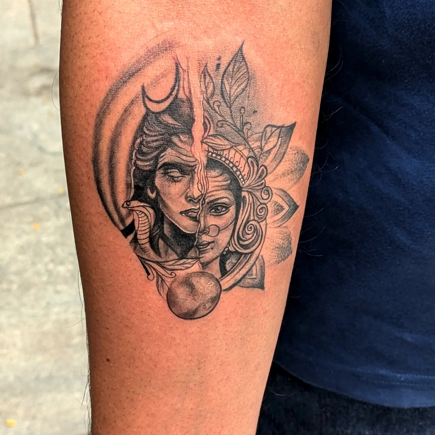 Duality Face Arm Tattoo in Black and Grey