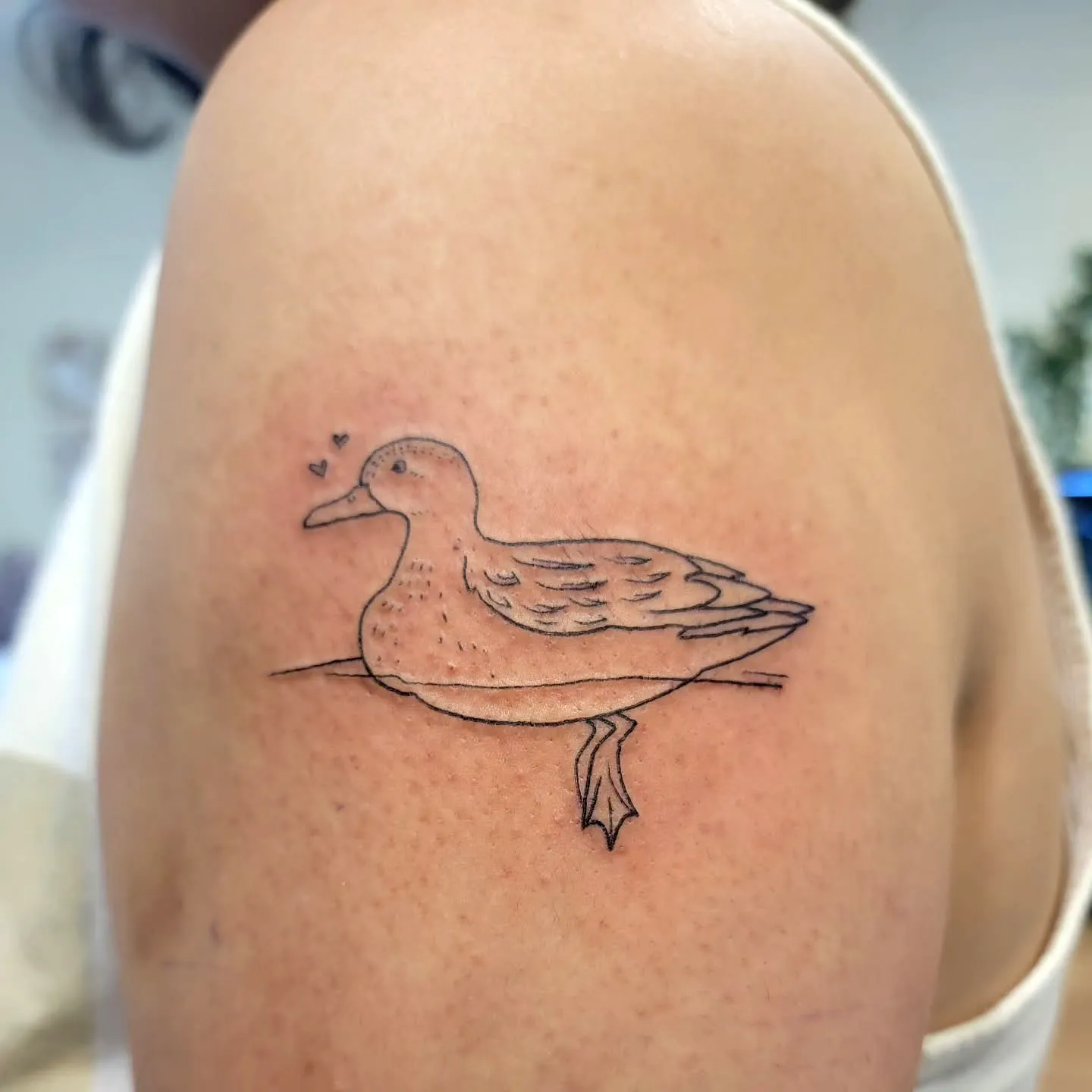 Duck Minimalist Upper Arm Tattoo