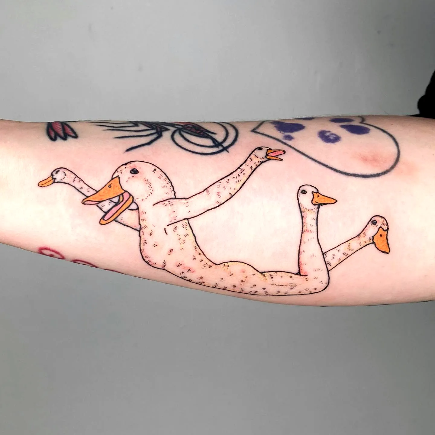Ducks Forearm Tattoo Whimsical Design