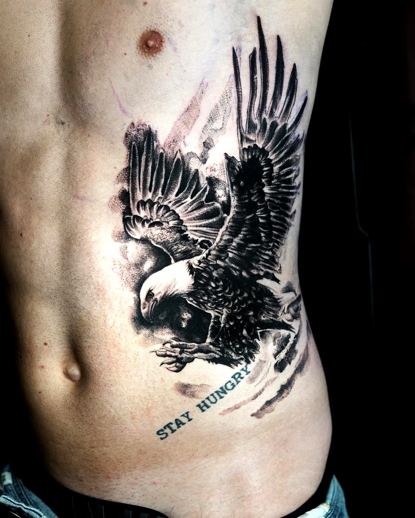Eagle Rib Tattoo with Colorful Background