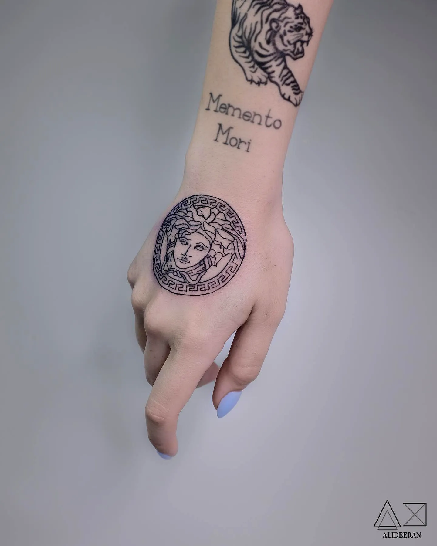 Female Hand Tattoo with Greek Key