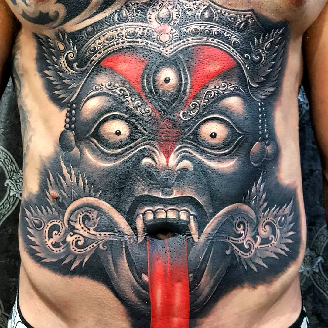 Fierce Deity Chest Tattoo in Black and Red