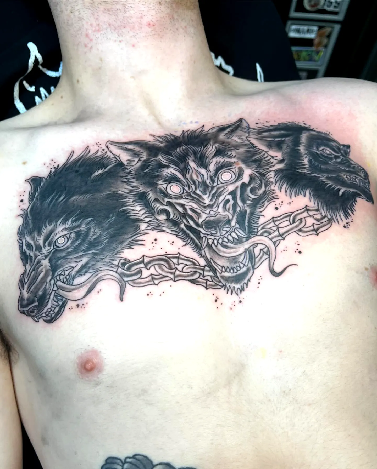 Fierce Wolf Heads Chest Tattoo