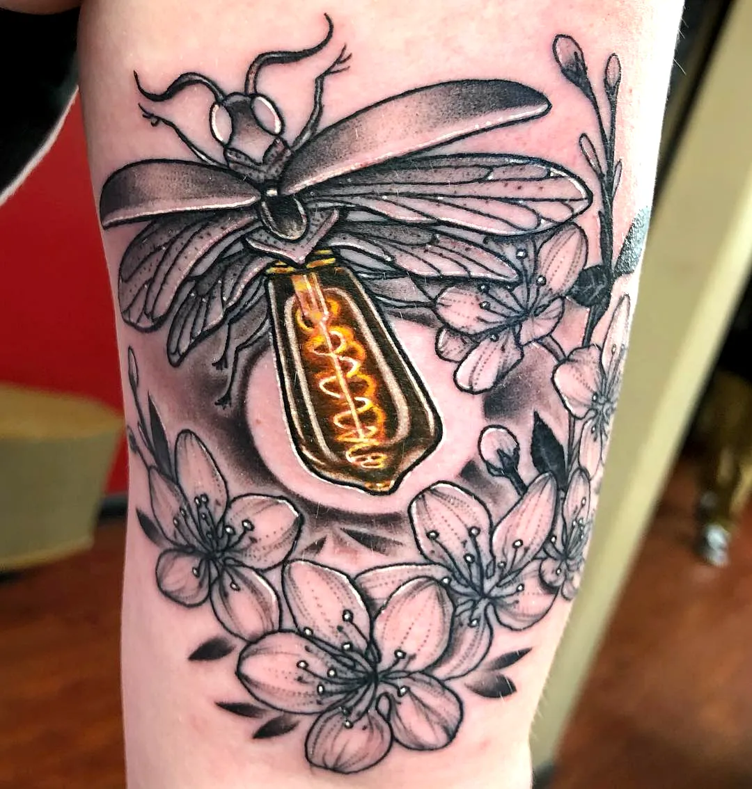 Firefly and Flowers Arm Tattoo