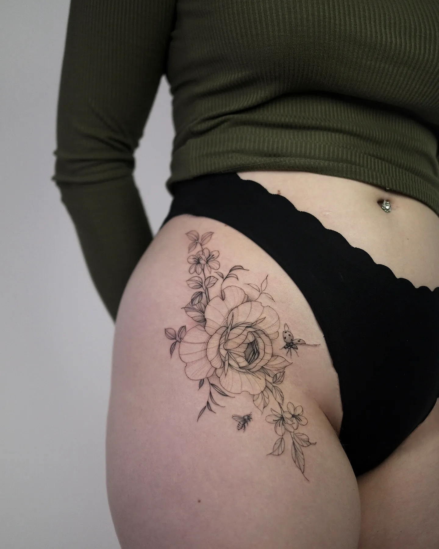 Floral Bee Upper Thigh Tattoo