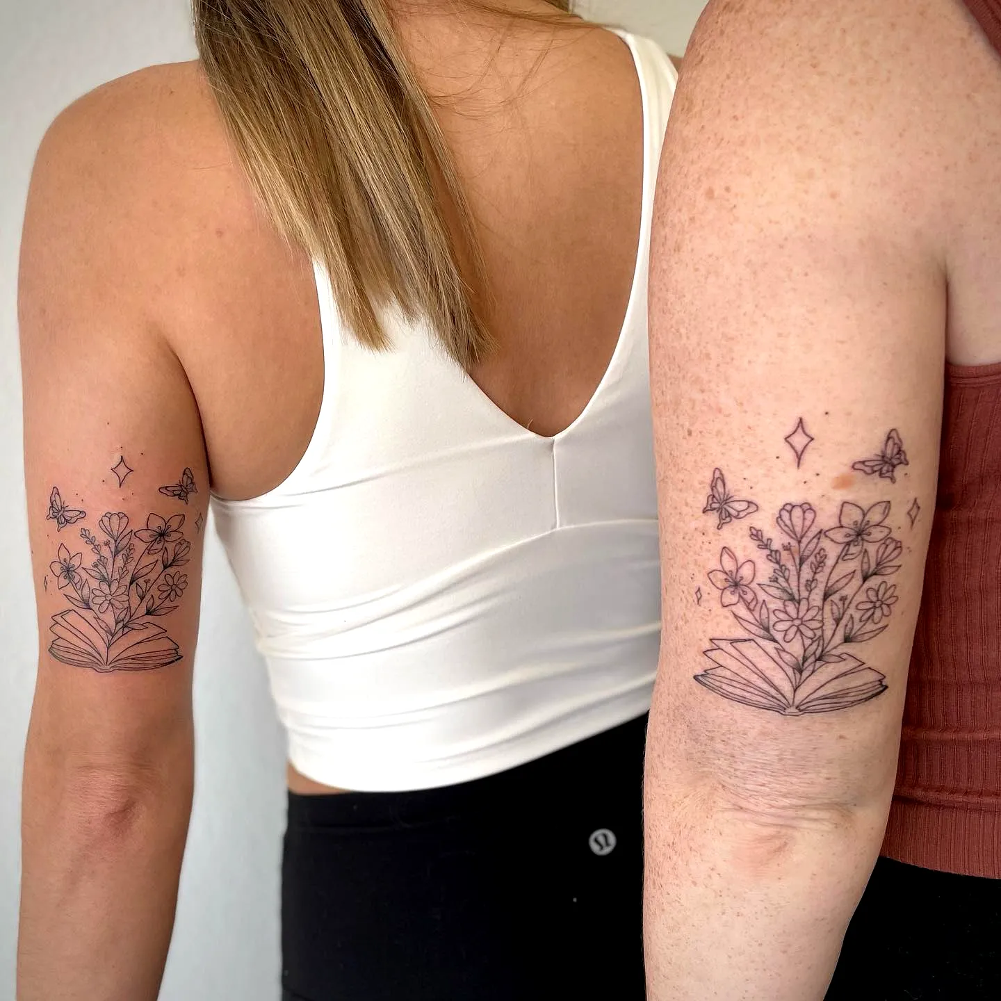 Floral Book Upper Arm Tattoos