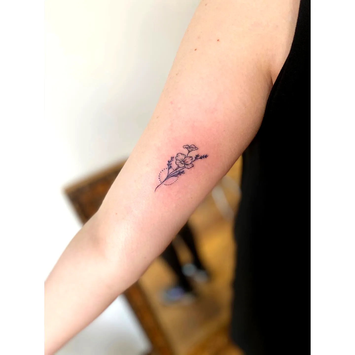 Floral Forearm Tattoo in Thin Black Lines