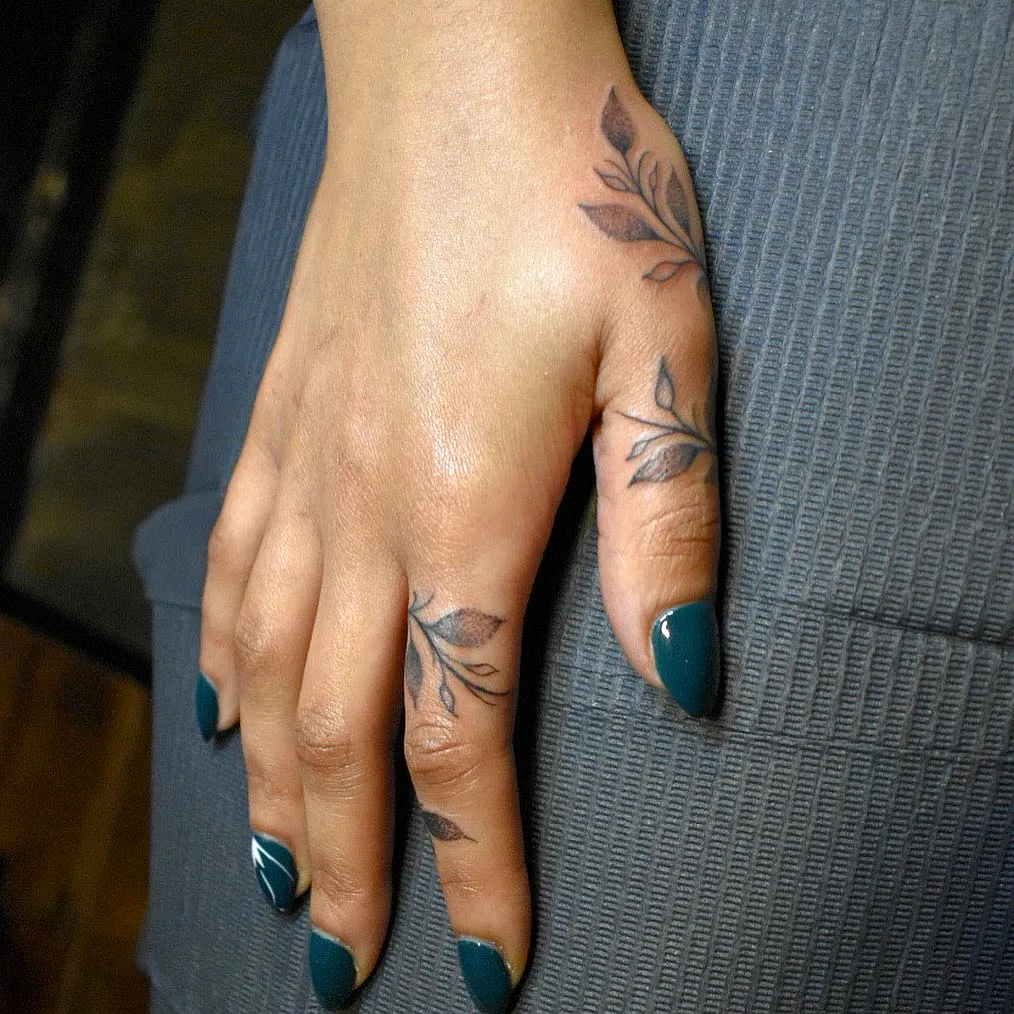 Floral Hand Tattoo in Minimalist Style