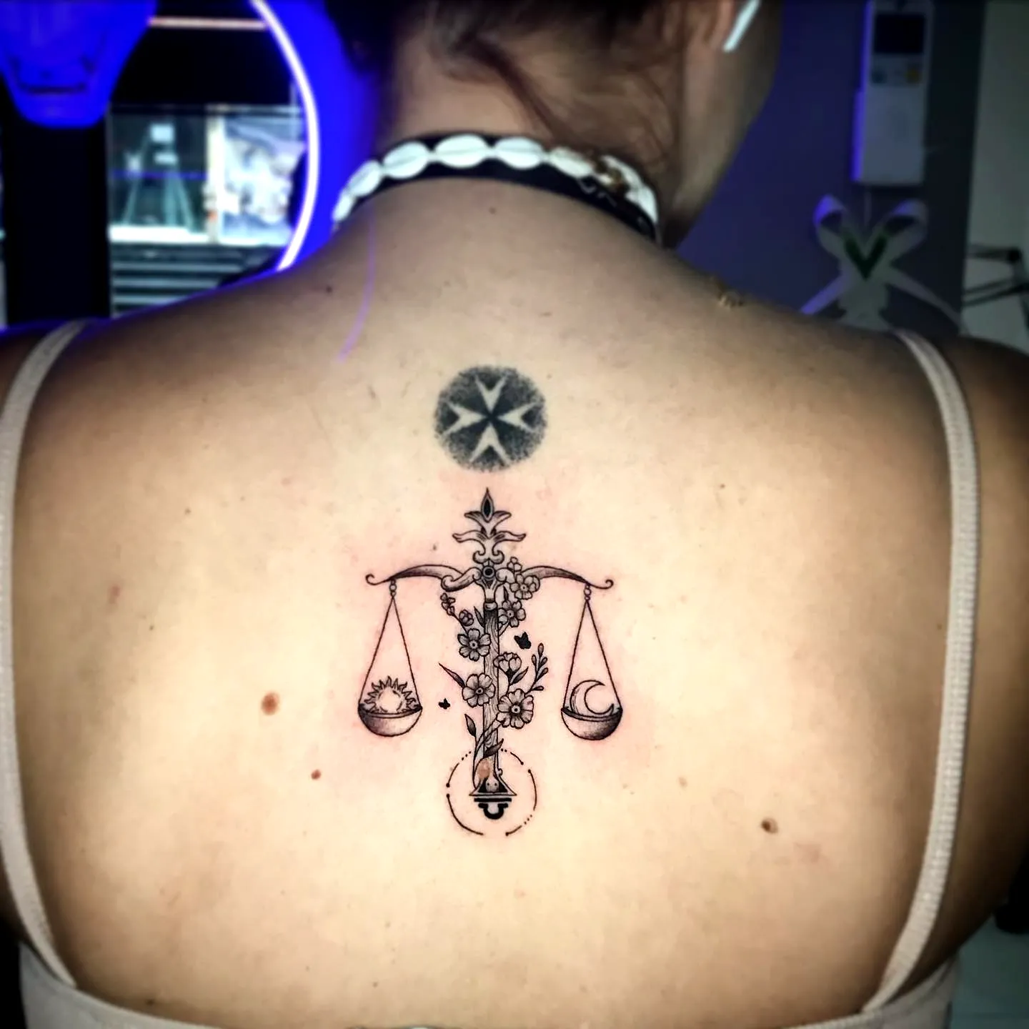 Floral Scale Upper Back Tattoo