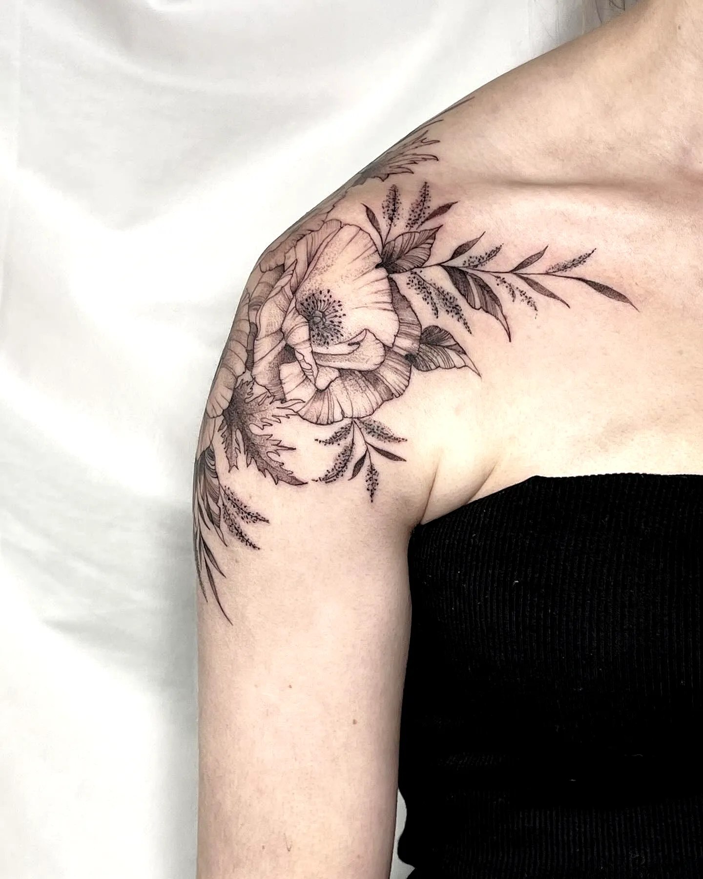 Floral Shoulder Tattoo in Black Ink