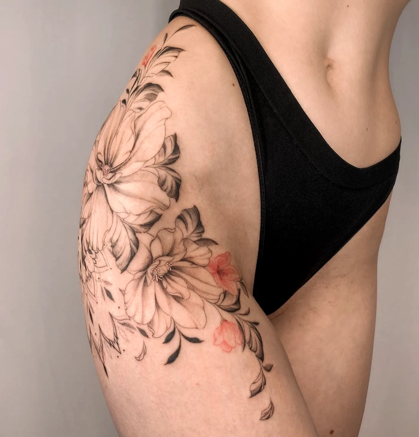 Floral Thigh Tattoo with Soft Shading