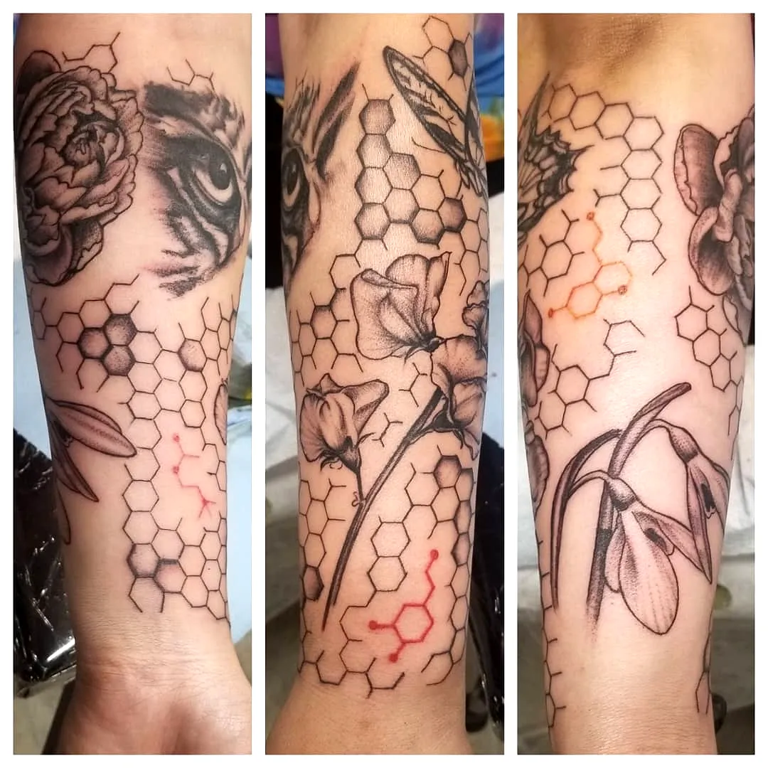 Floral Tigers Eye Forearm Tattoo