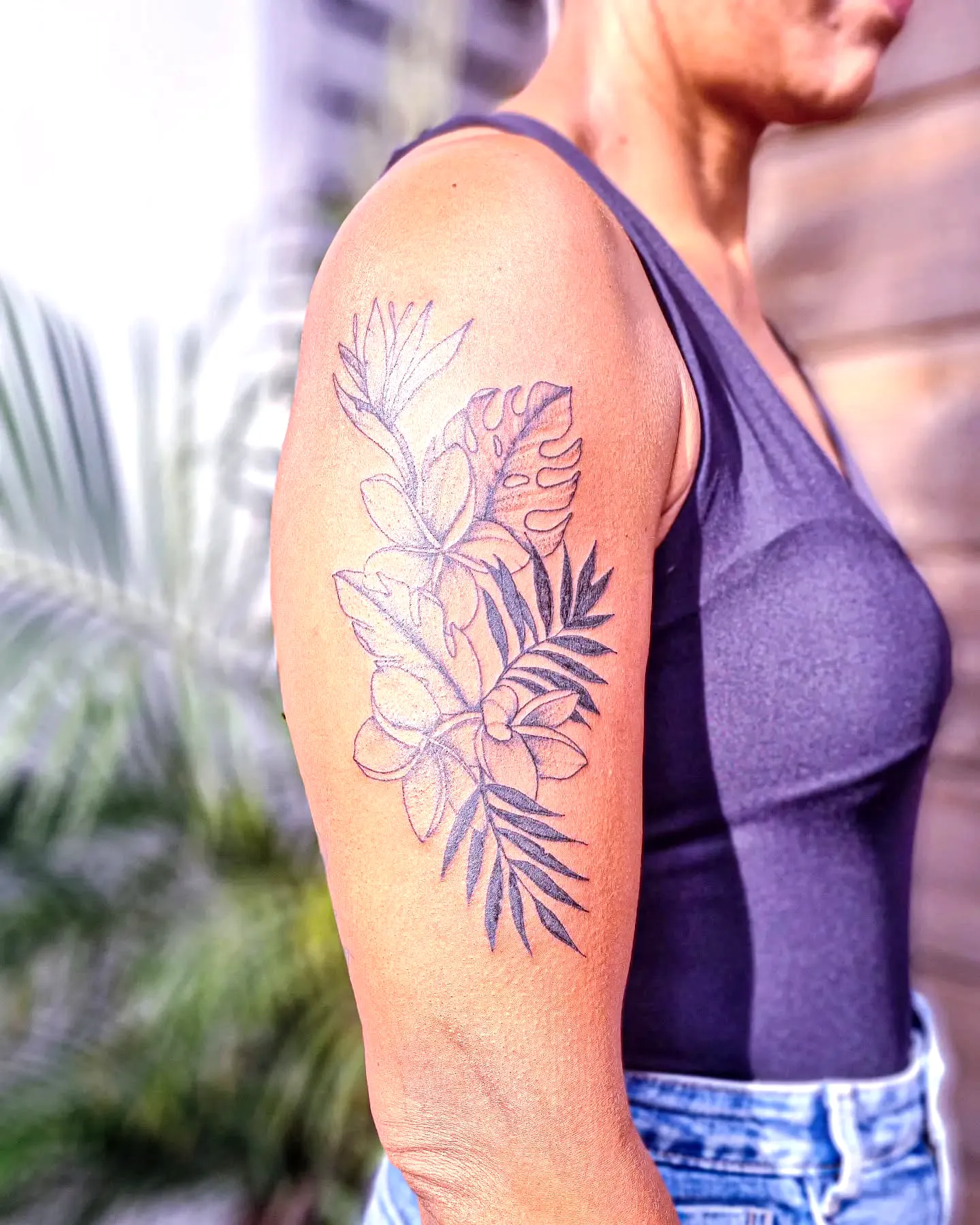 Floral Upper Arm Silhouette Tattoo