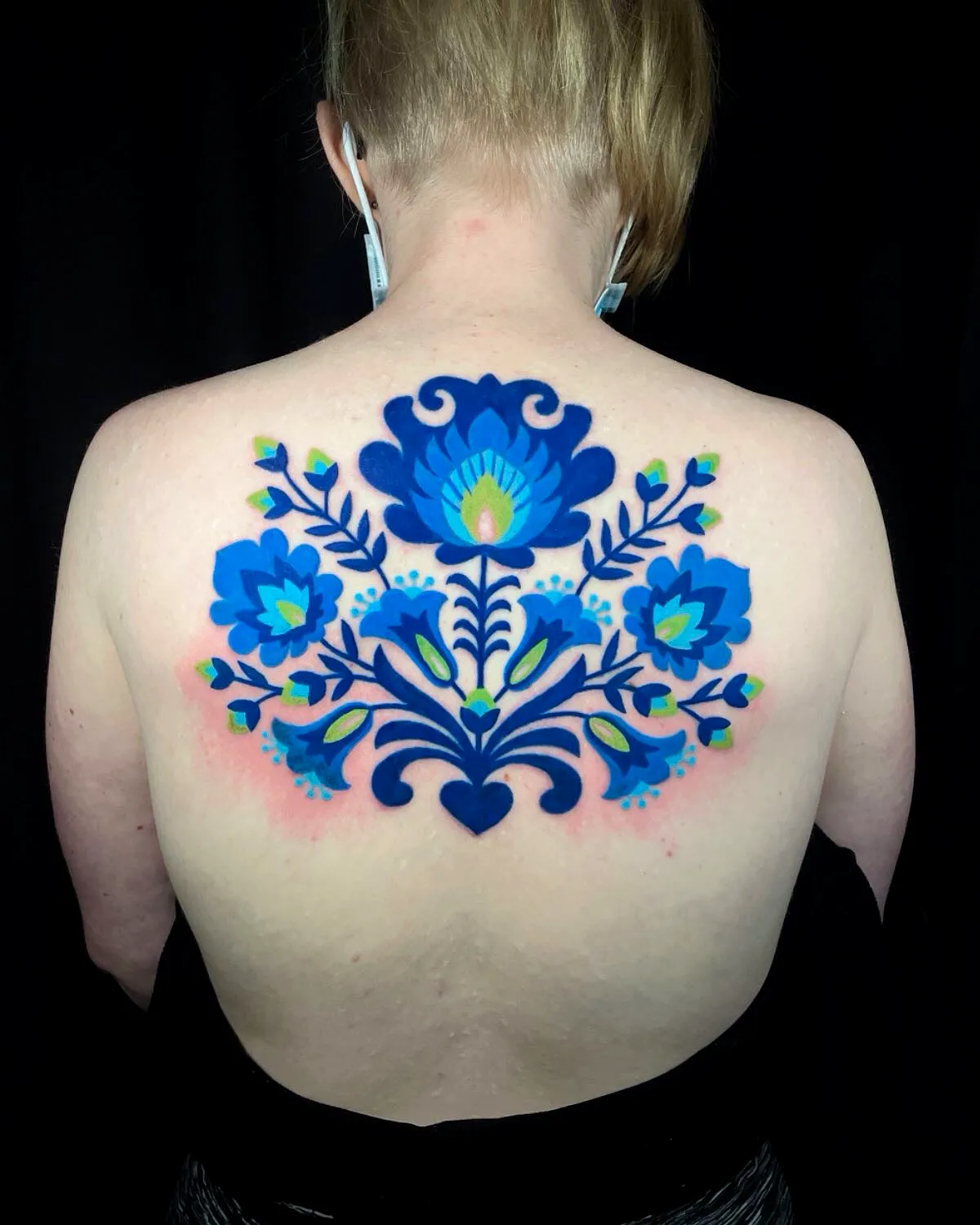 Floral Upper Back Tattoo in Blue and Green