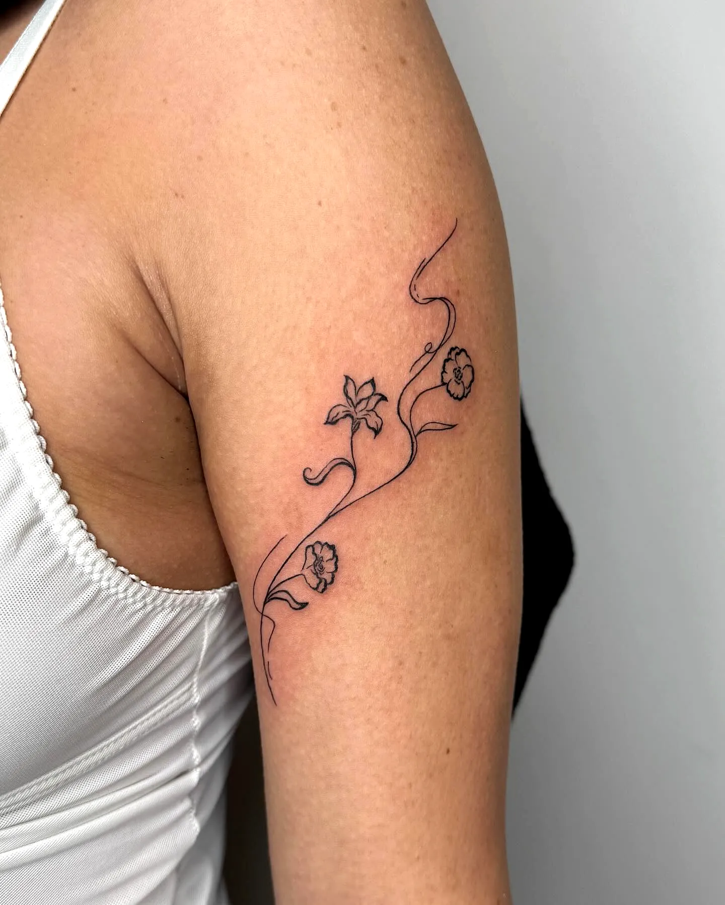 Floral Vine Upper Arm Tattoo