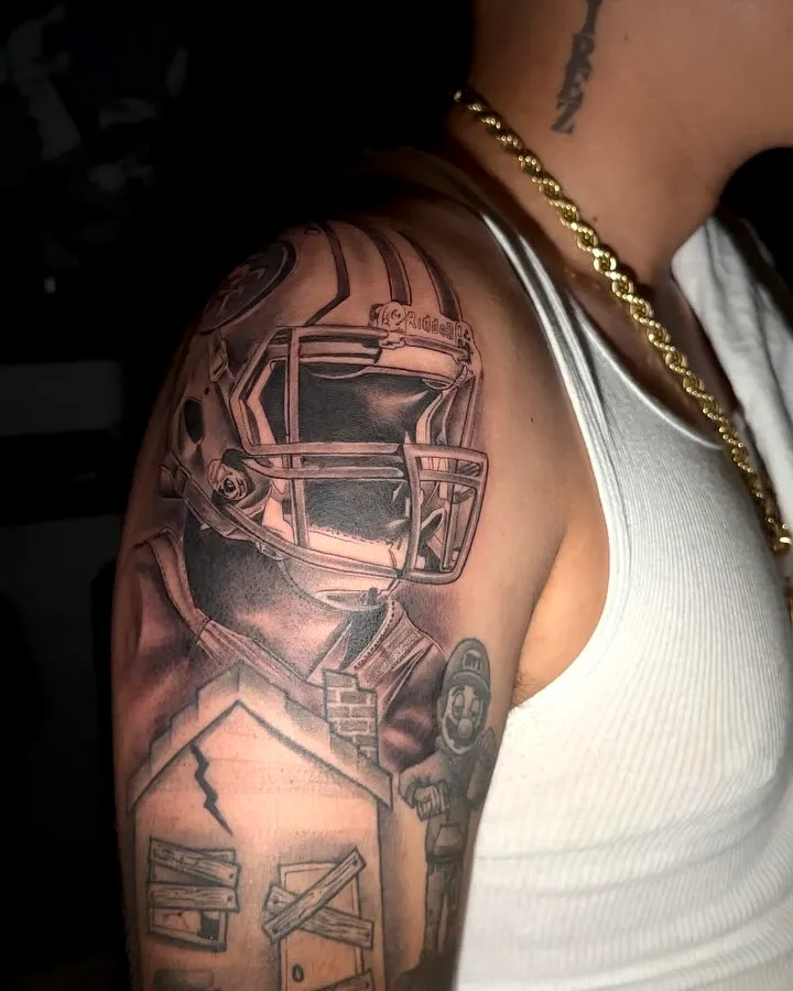 Football Player Upper Arm Tattoo