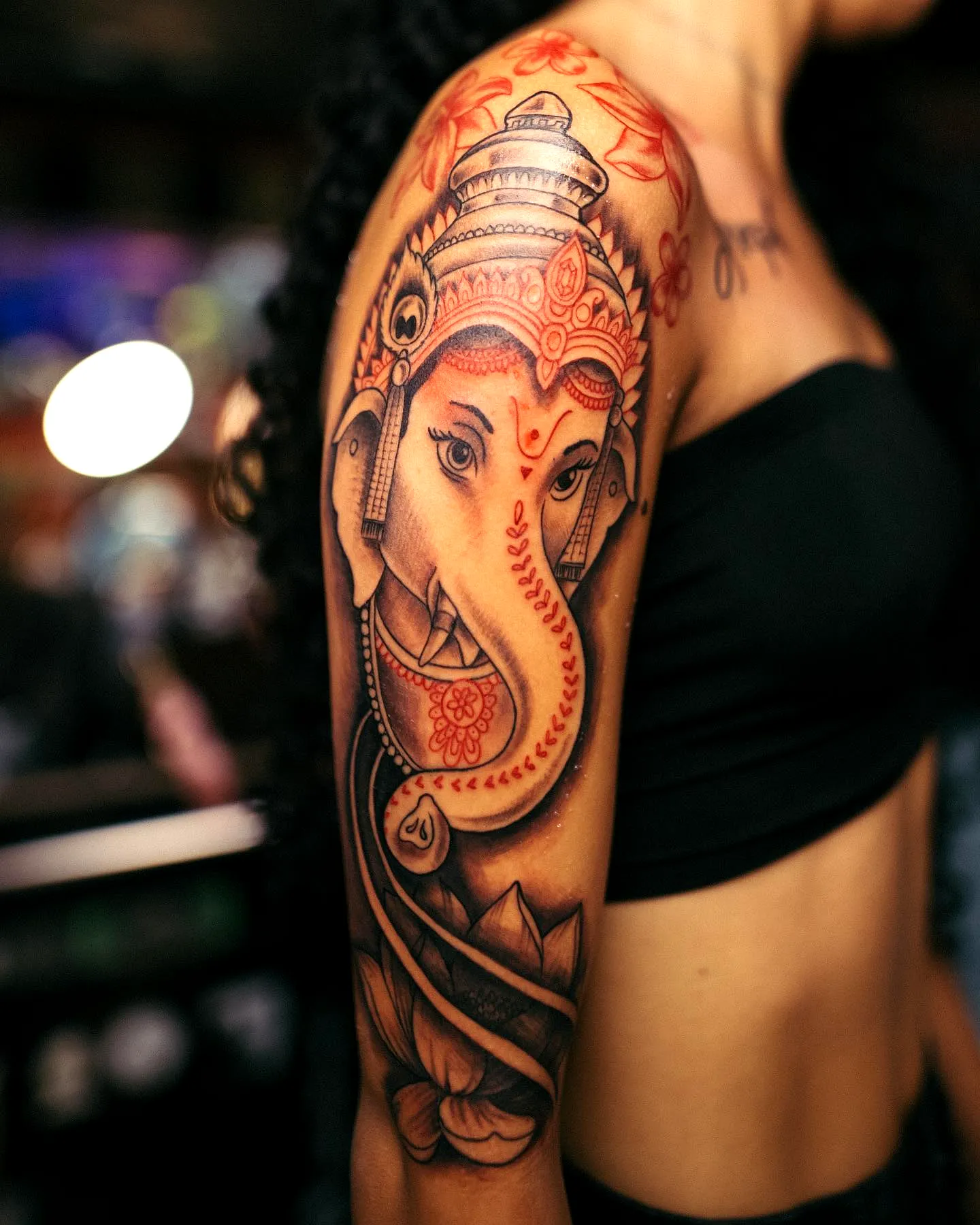 Ganesha Floral Upper Arm Tattoo