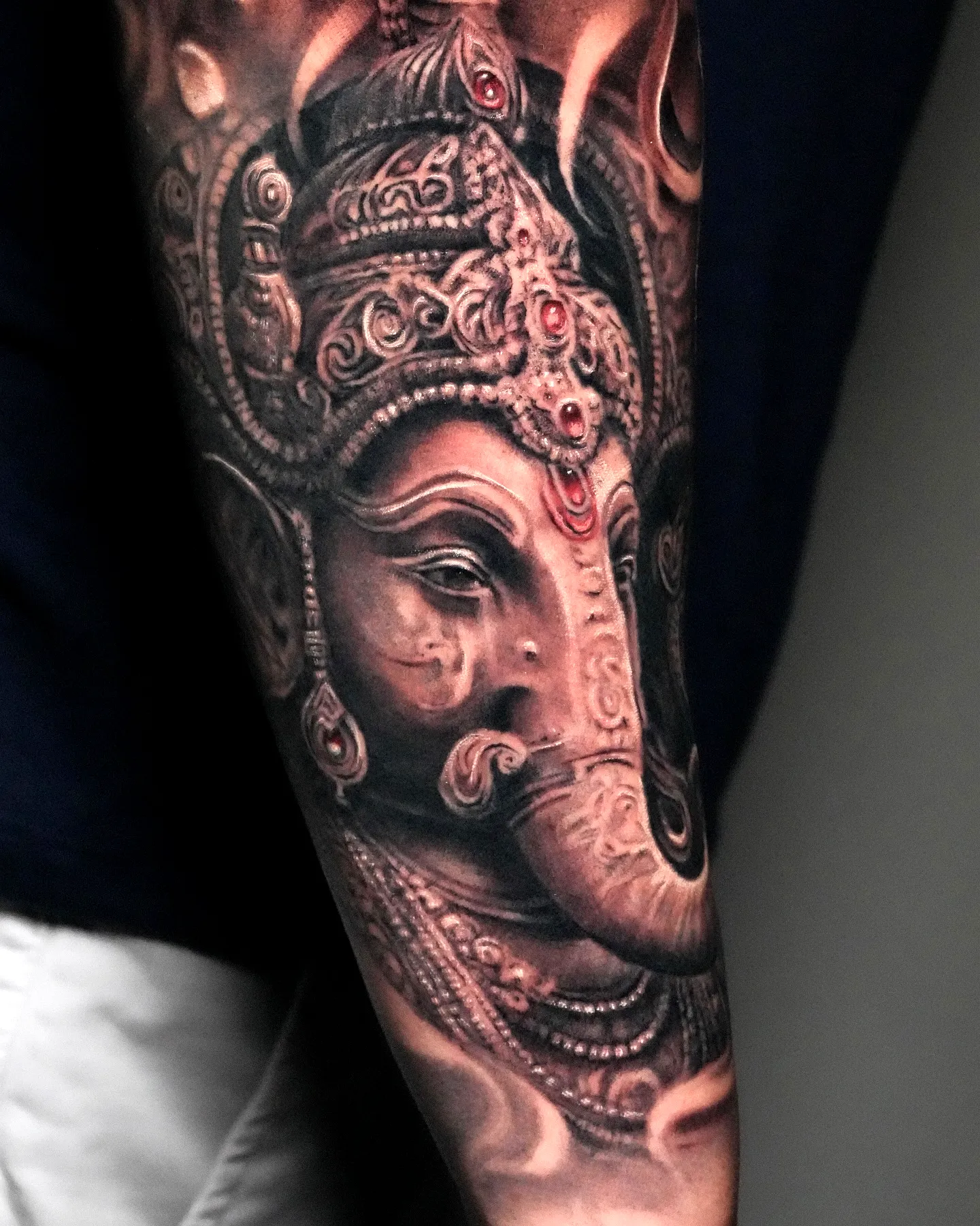 Ganesha Forearm Tattoo in Grey and Red