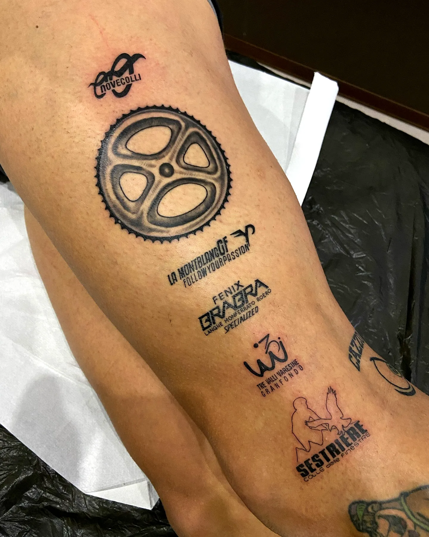 Gear Calf Tattoo with Logos and Text