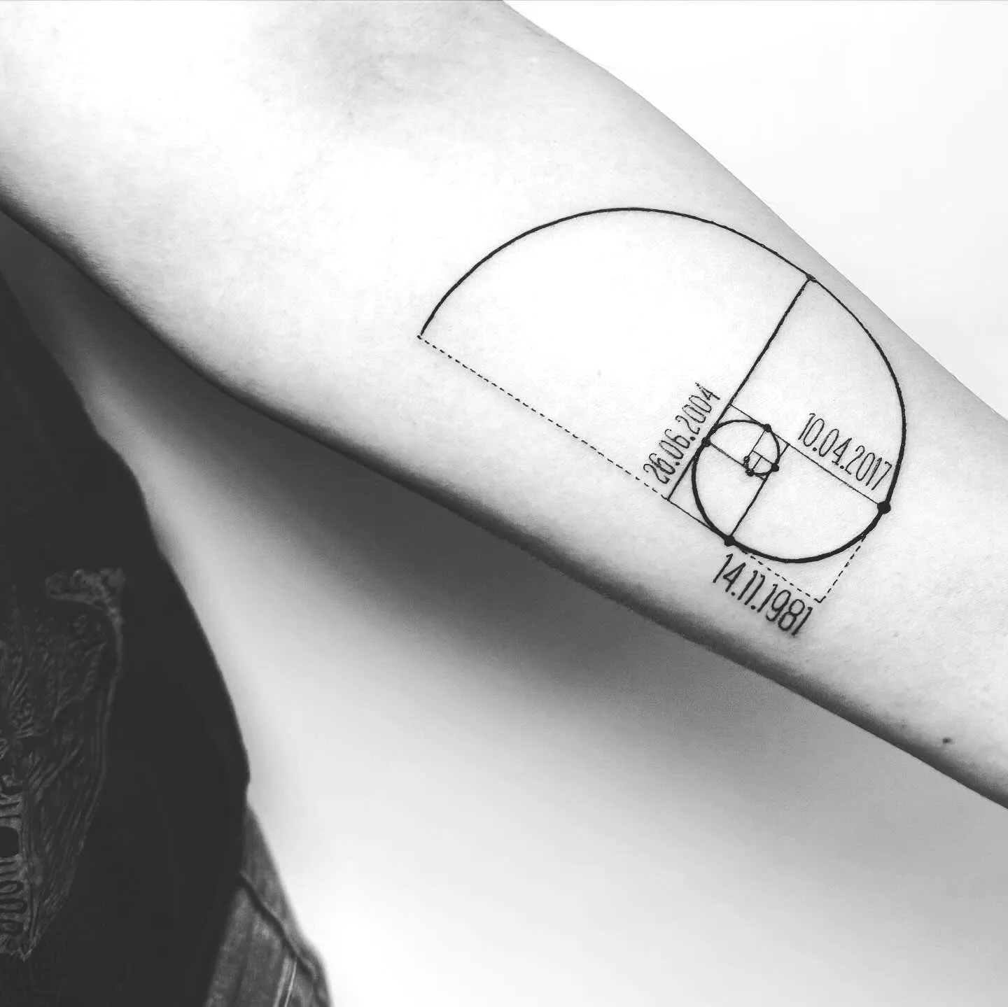 Geometric Spiral Inner Forearm Tattoo