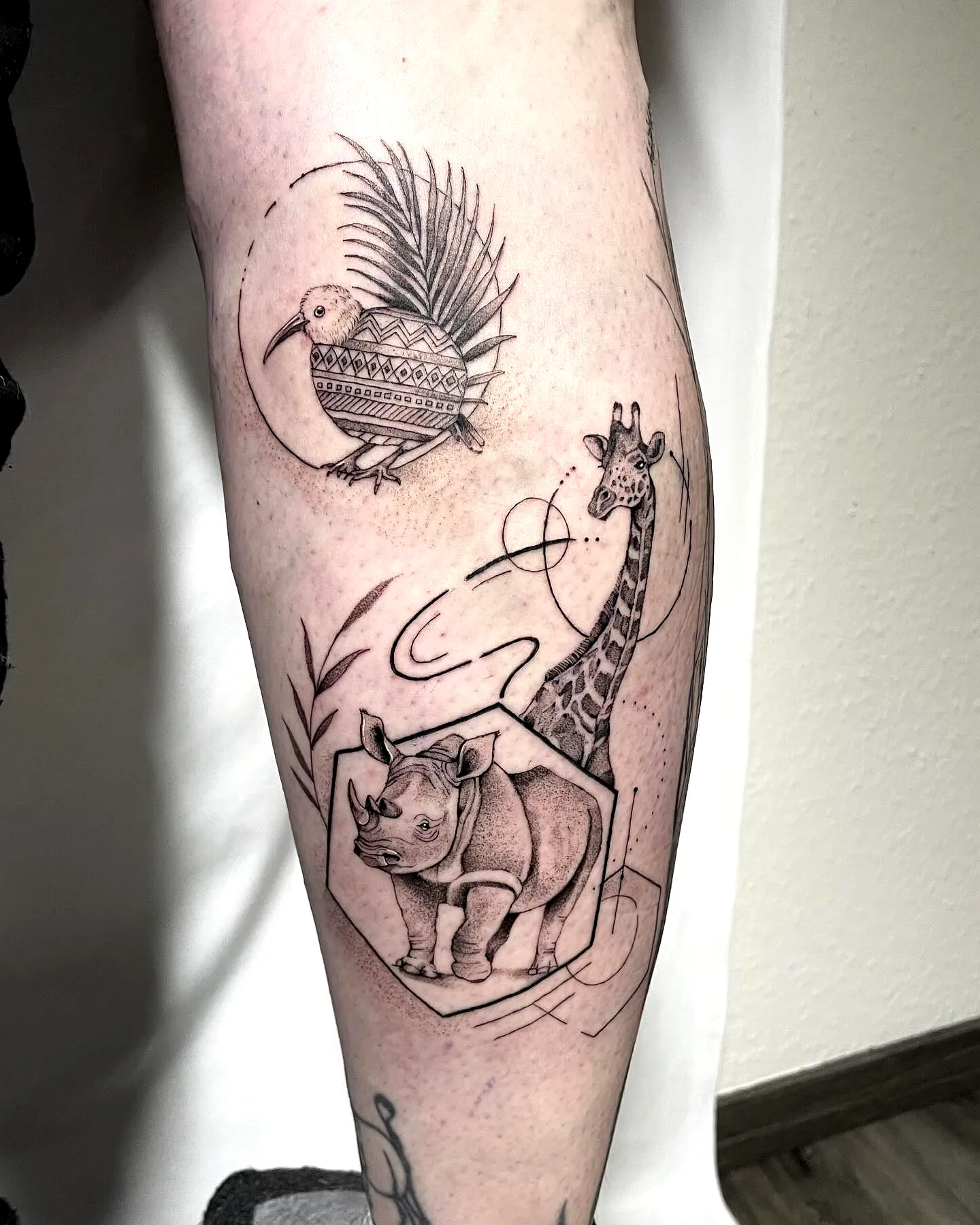 Giraffe Rhinoceros Calf Tattoo Design