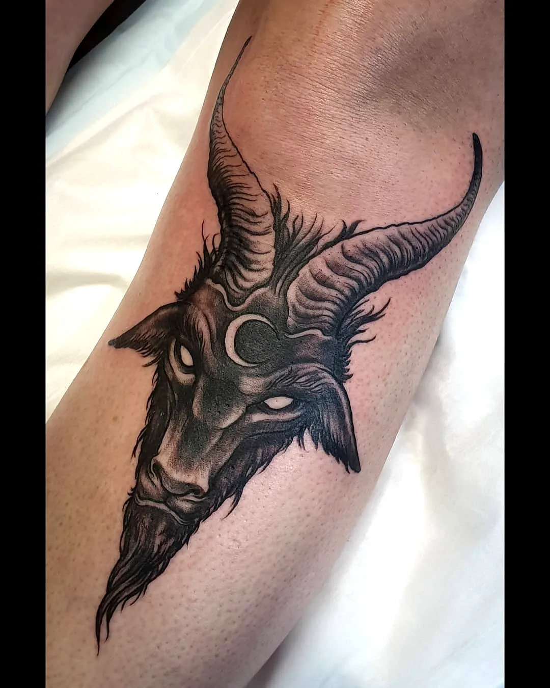 Goat Leg Tattoo with Mystical Elements