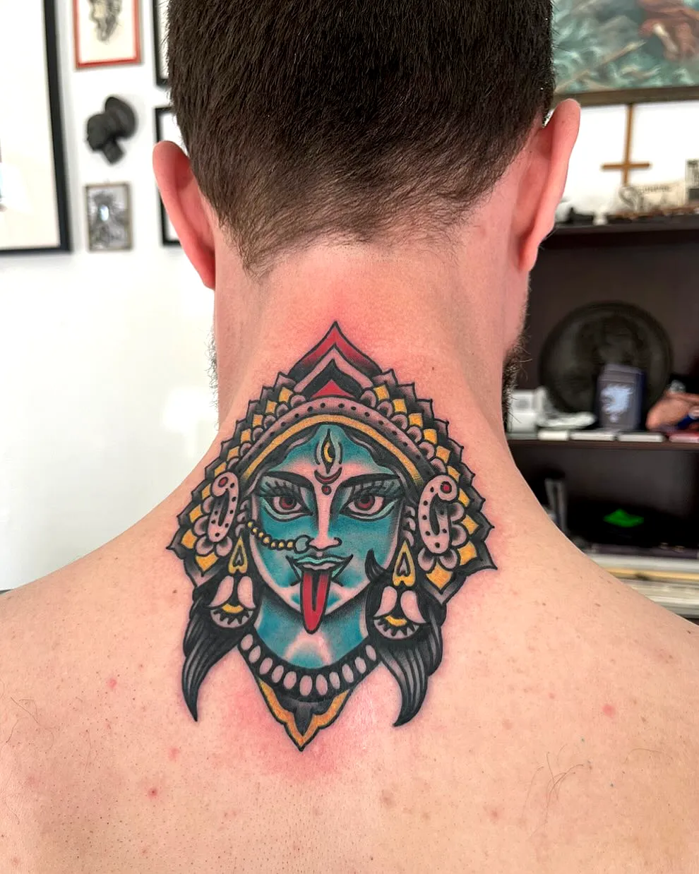 Goddess neck tattoo in vibrant colors