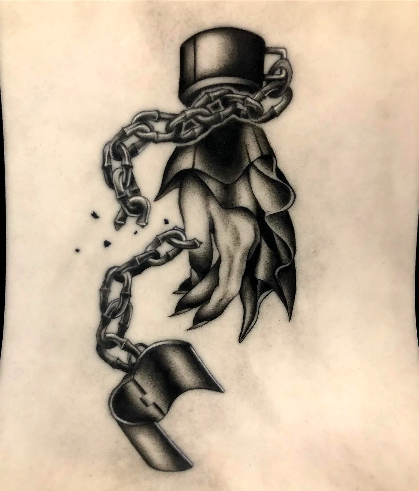 Grayscale Hand Breaking Free Tattoo