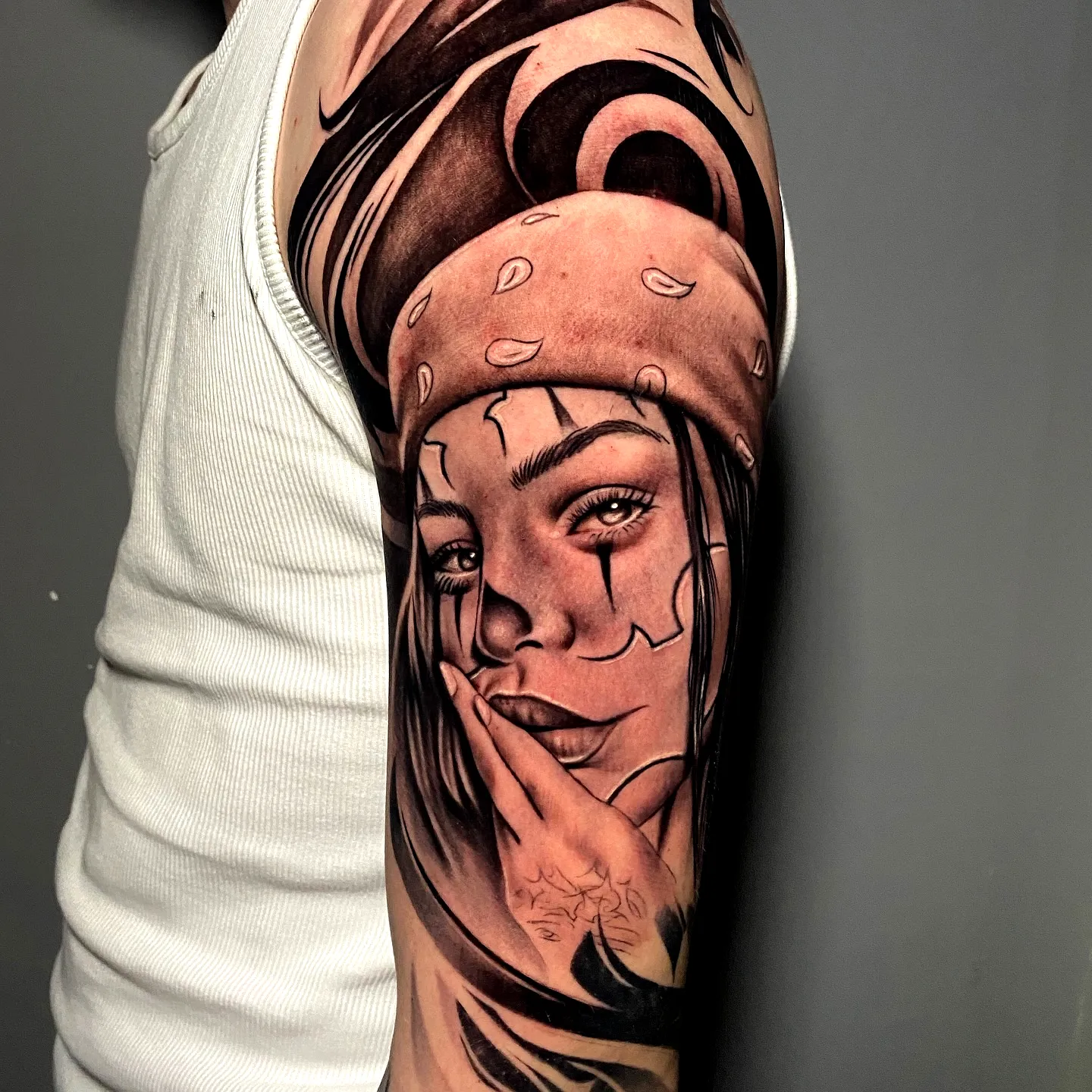 Grayscale Woman Portrait Arm Tattoo