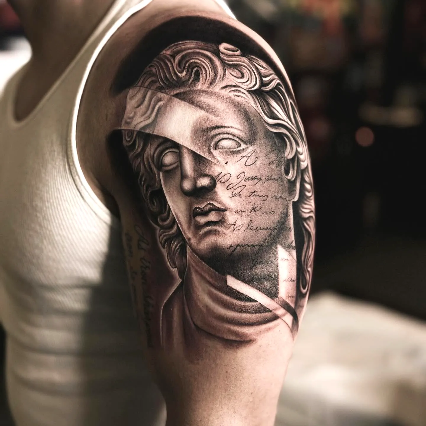 Greek Bust Upper Arm Tattoo