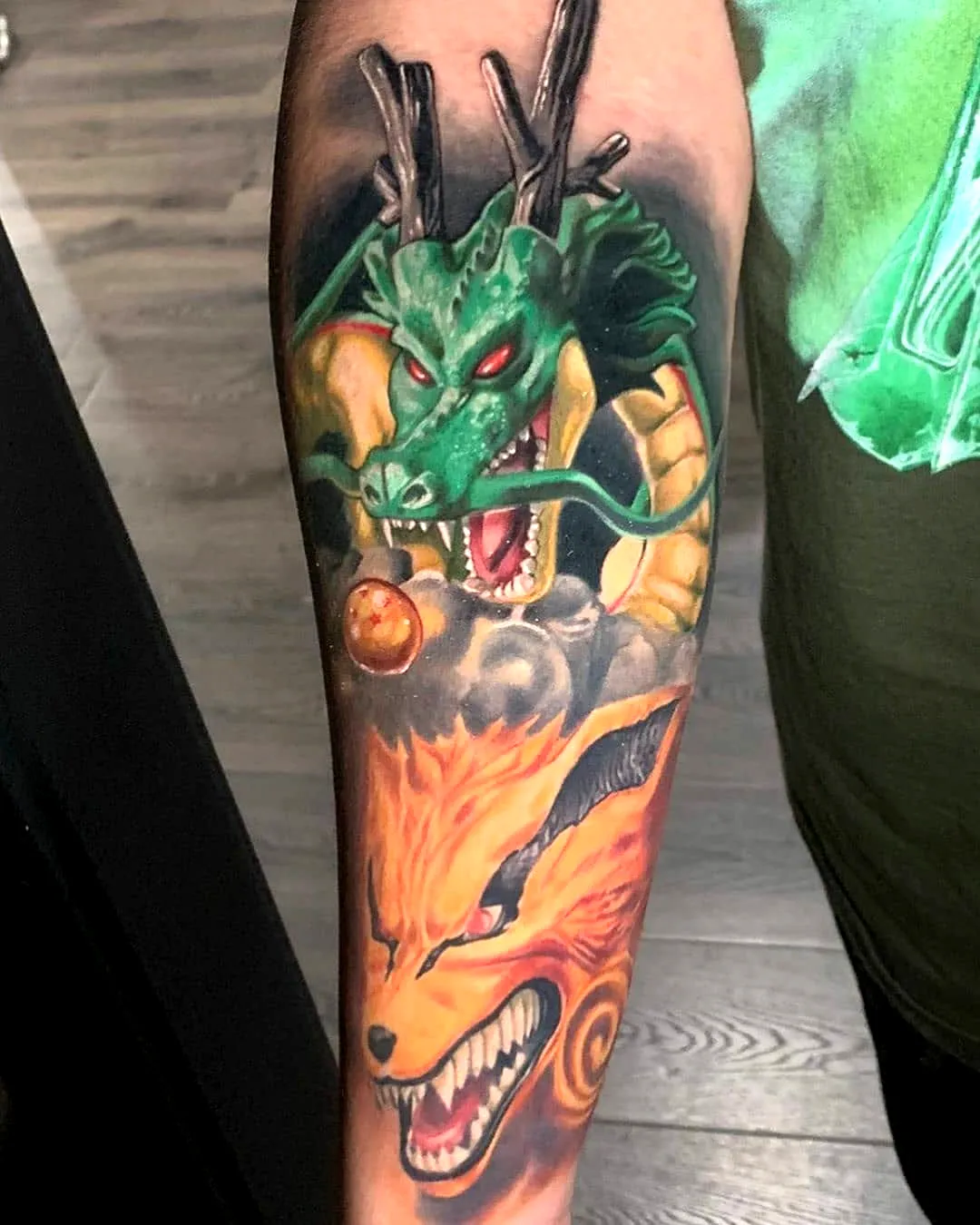 Green Dragon Orange Fox Forearm Tattoo