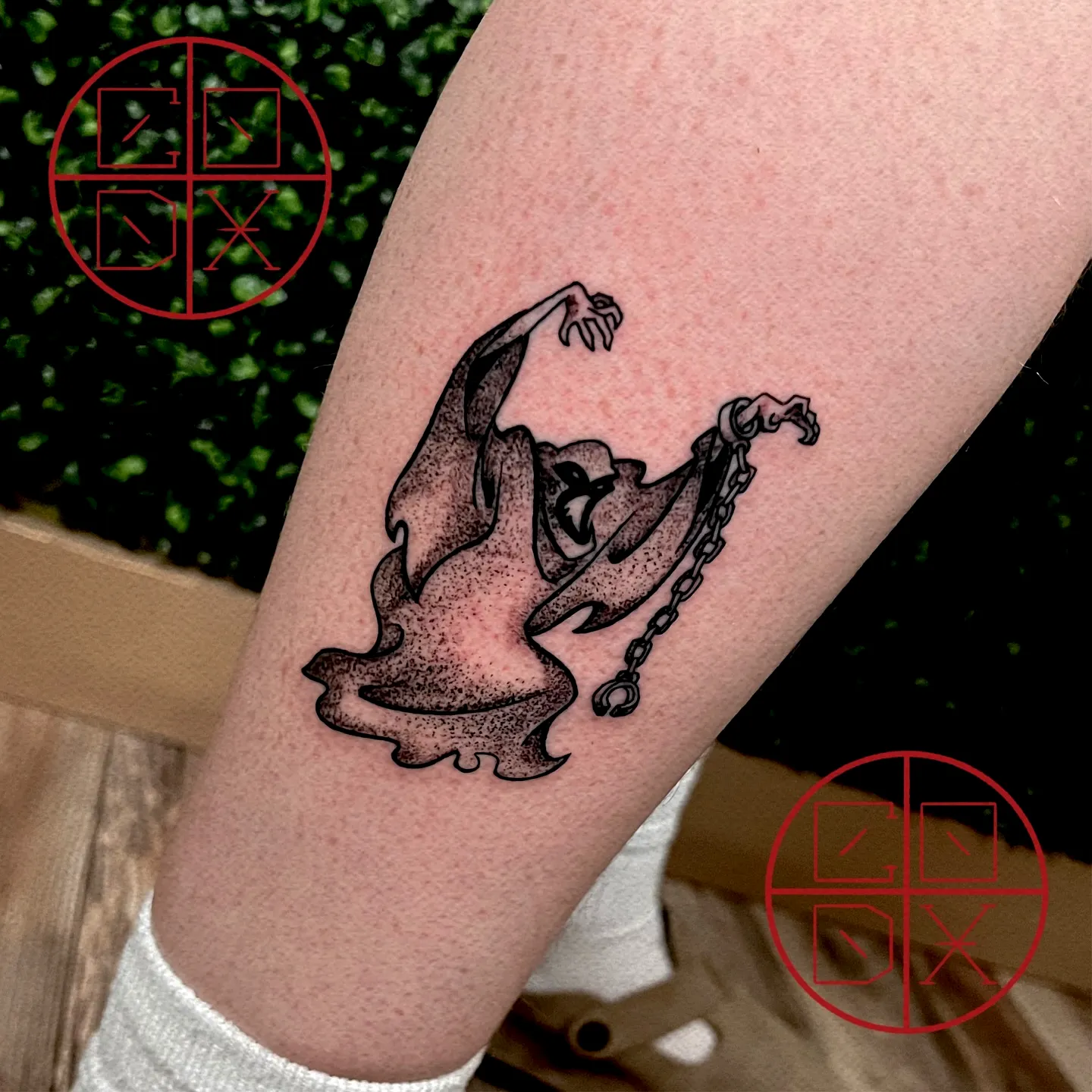 Grim Reaper Leg Tattoo in Black Ink