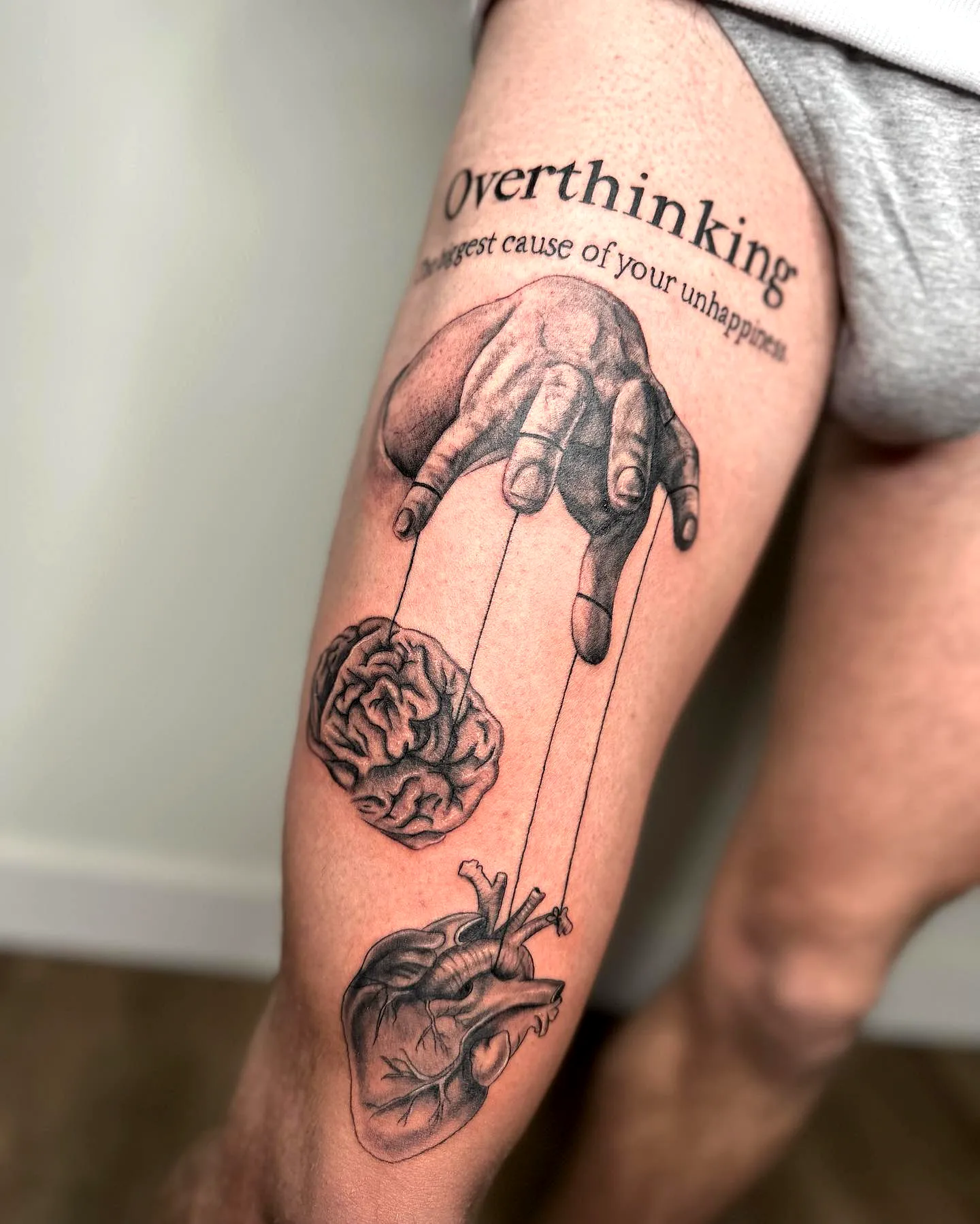 Hand Heart Brain Thigh Tattoo Design