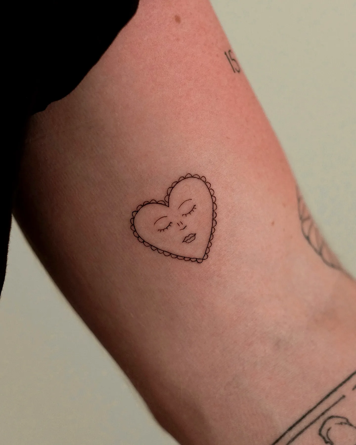 Heart Forearm Tattoo with Face