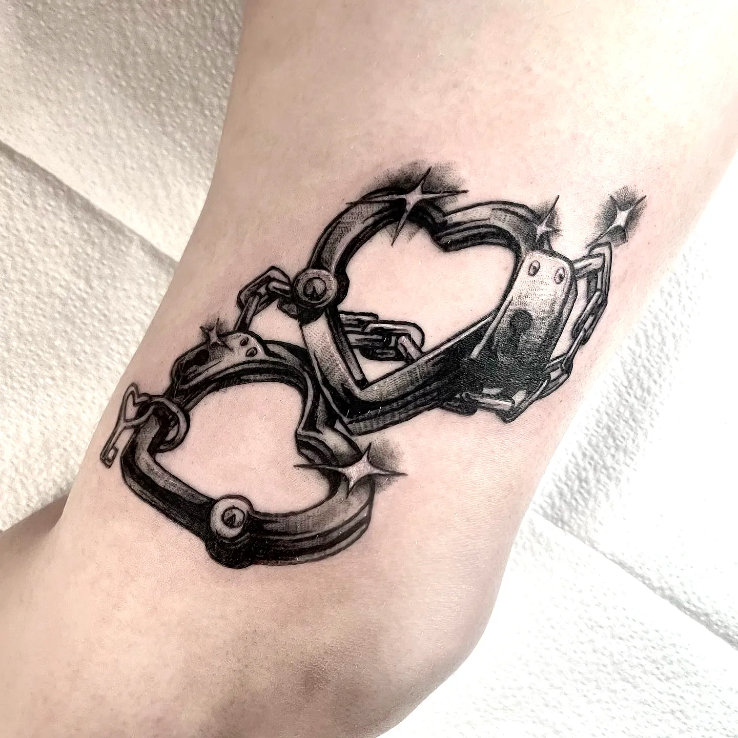 15 Timeless Handcuffs Tattoo Ideas For Unique Expression