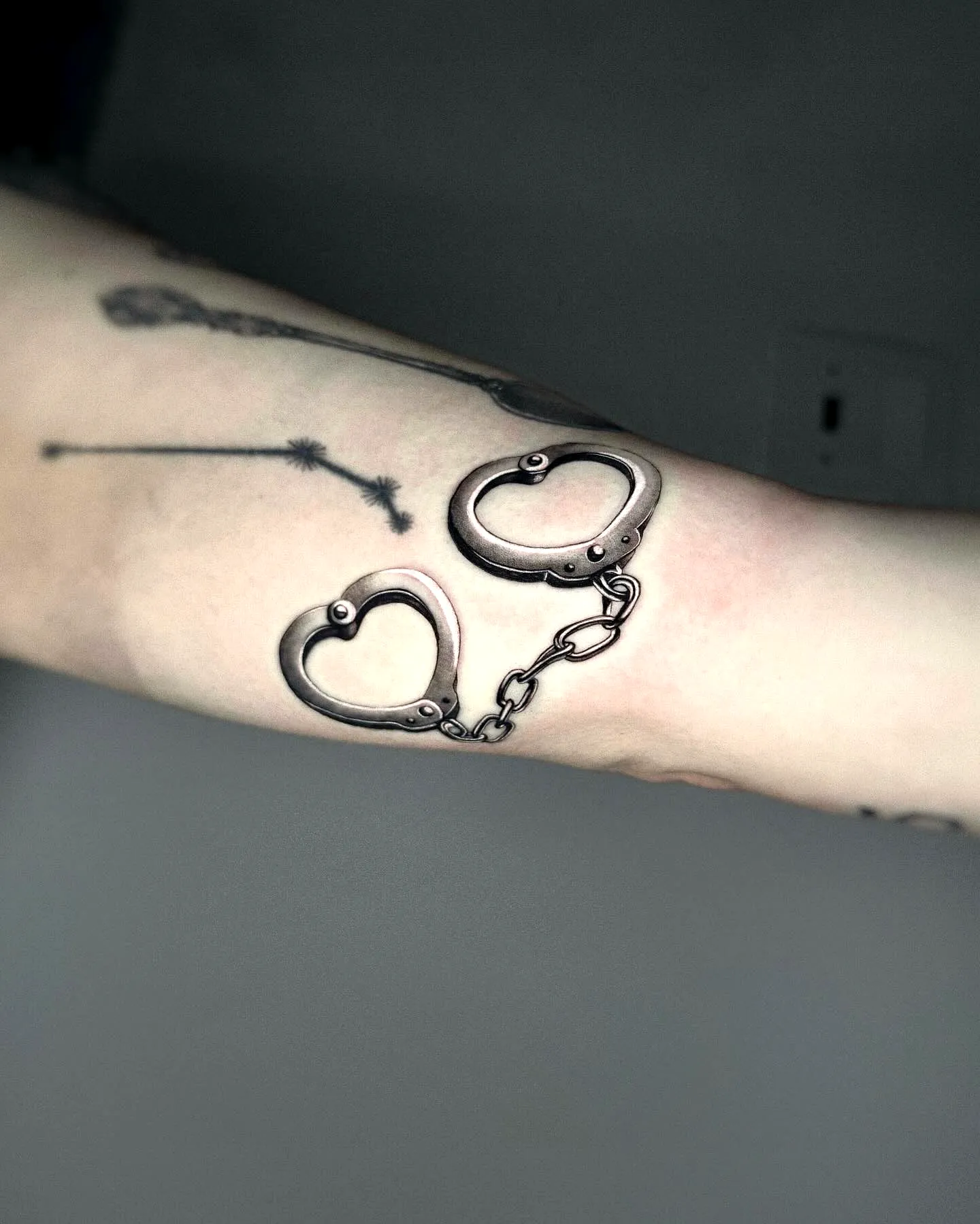 15 Timeless Handcuffs Tattoo Ideas For Unique Expression