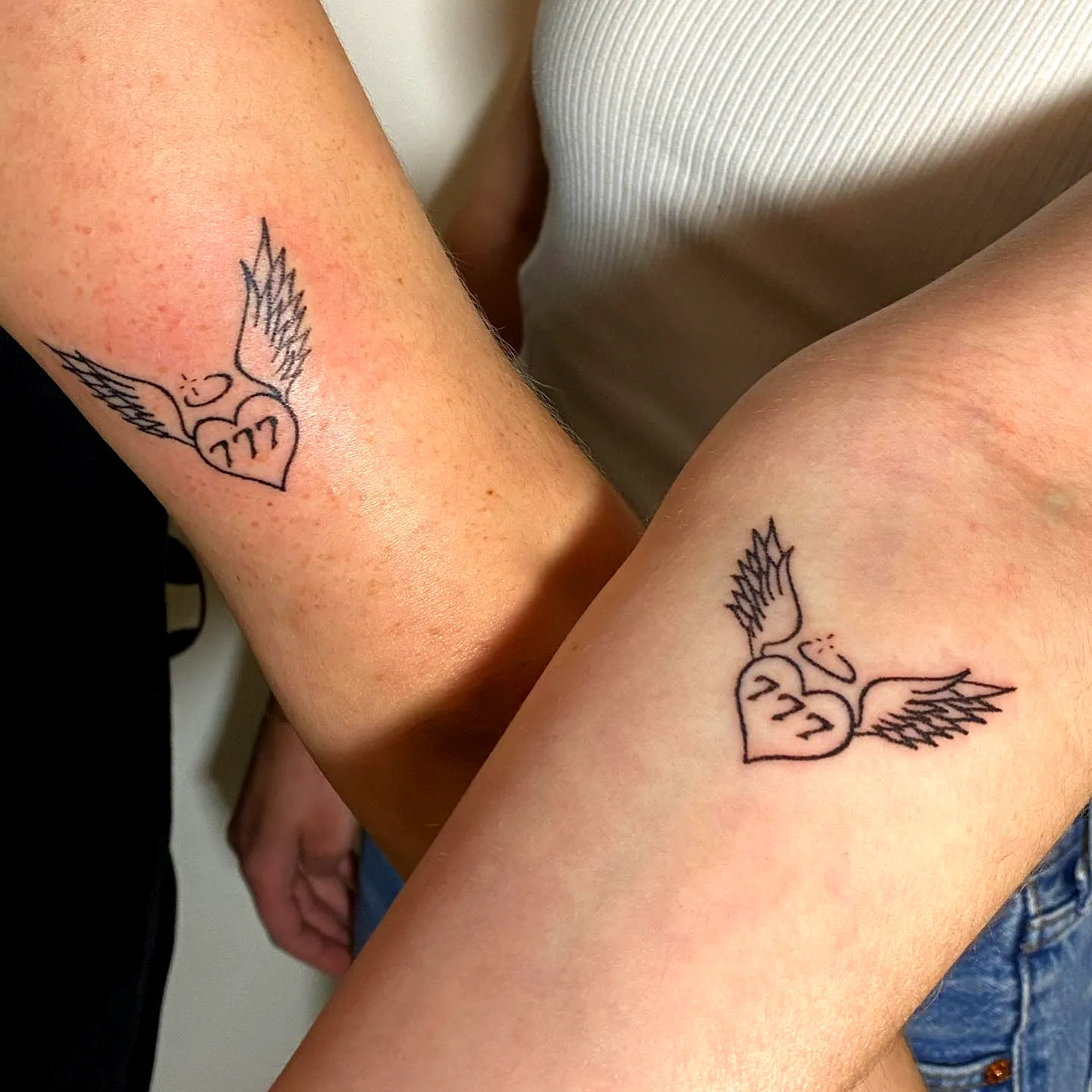 Heart with Wings Forearm Tattoo