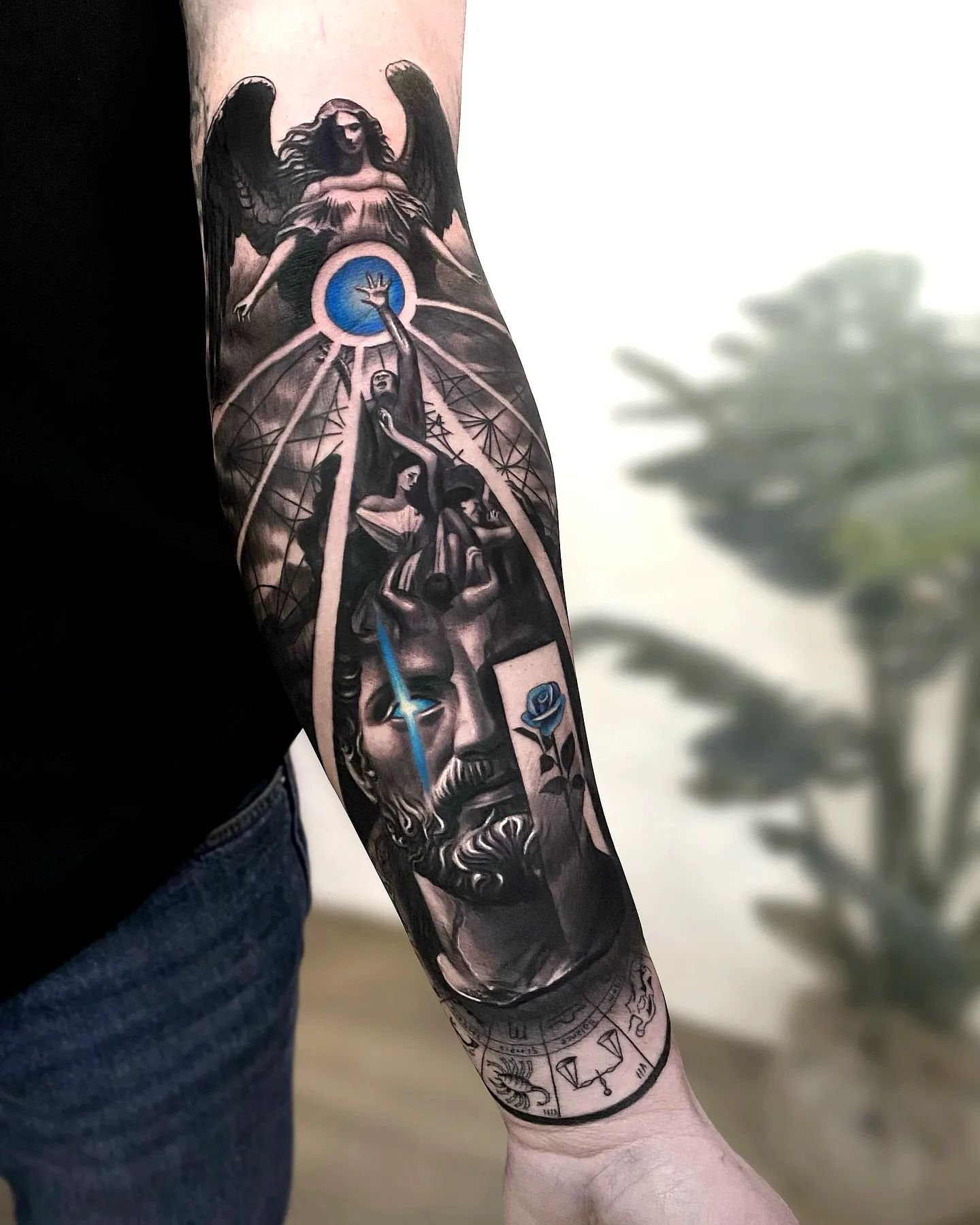 Heavenly Figure Forearm Tattoo