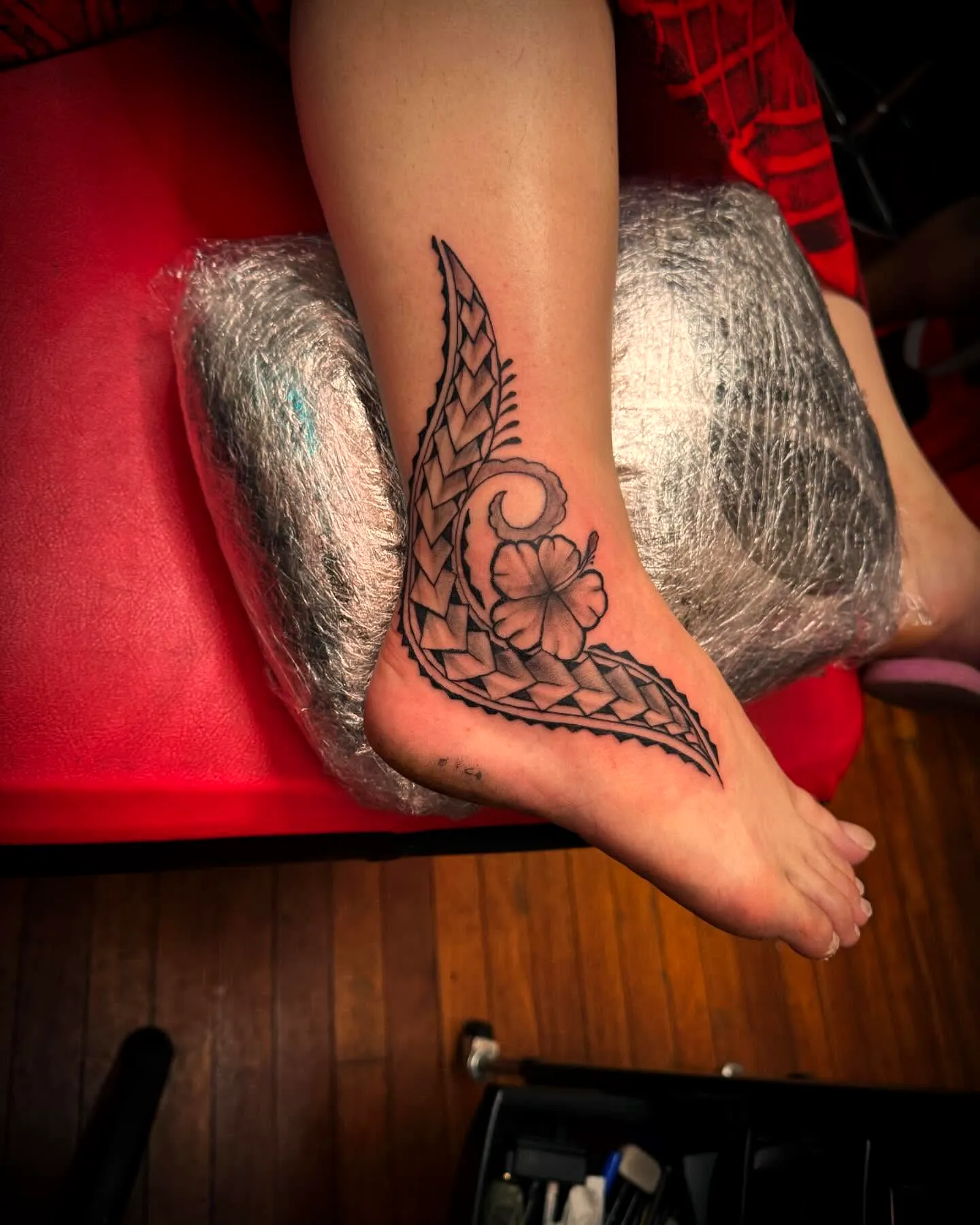 Hibiscus Ankle Tattoo with Flowing Vines